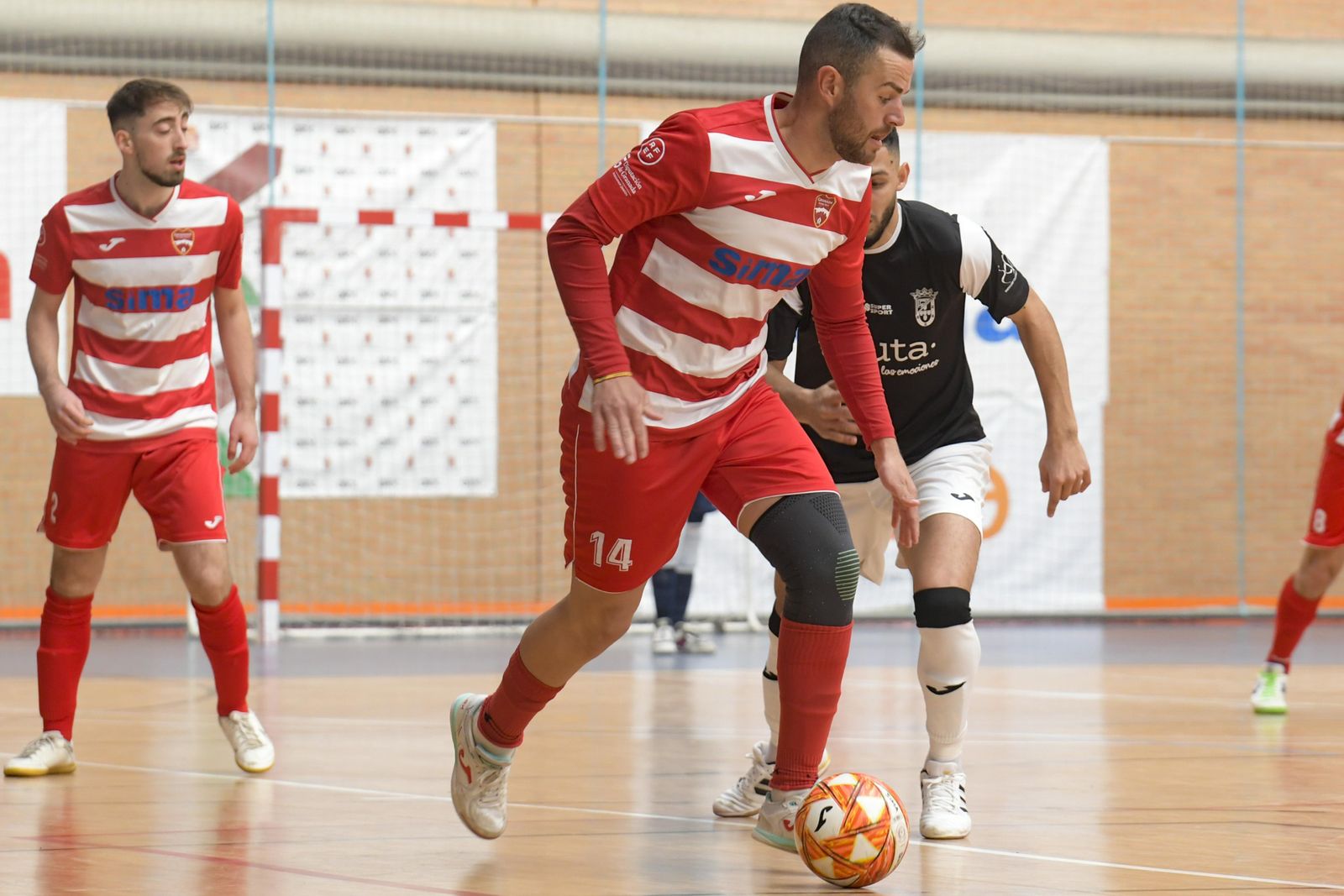 Imagen del encuentro entre el Sima Granada y el Ceutí.