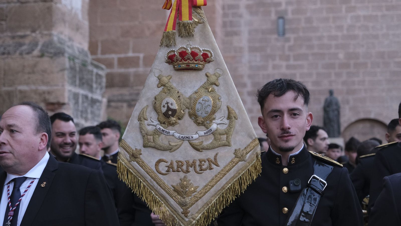 La Banda de Cornetas y Tambores Nuestra Señora del Carmen arropa al Cristo de Medinaceli, en imágenes