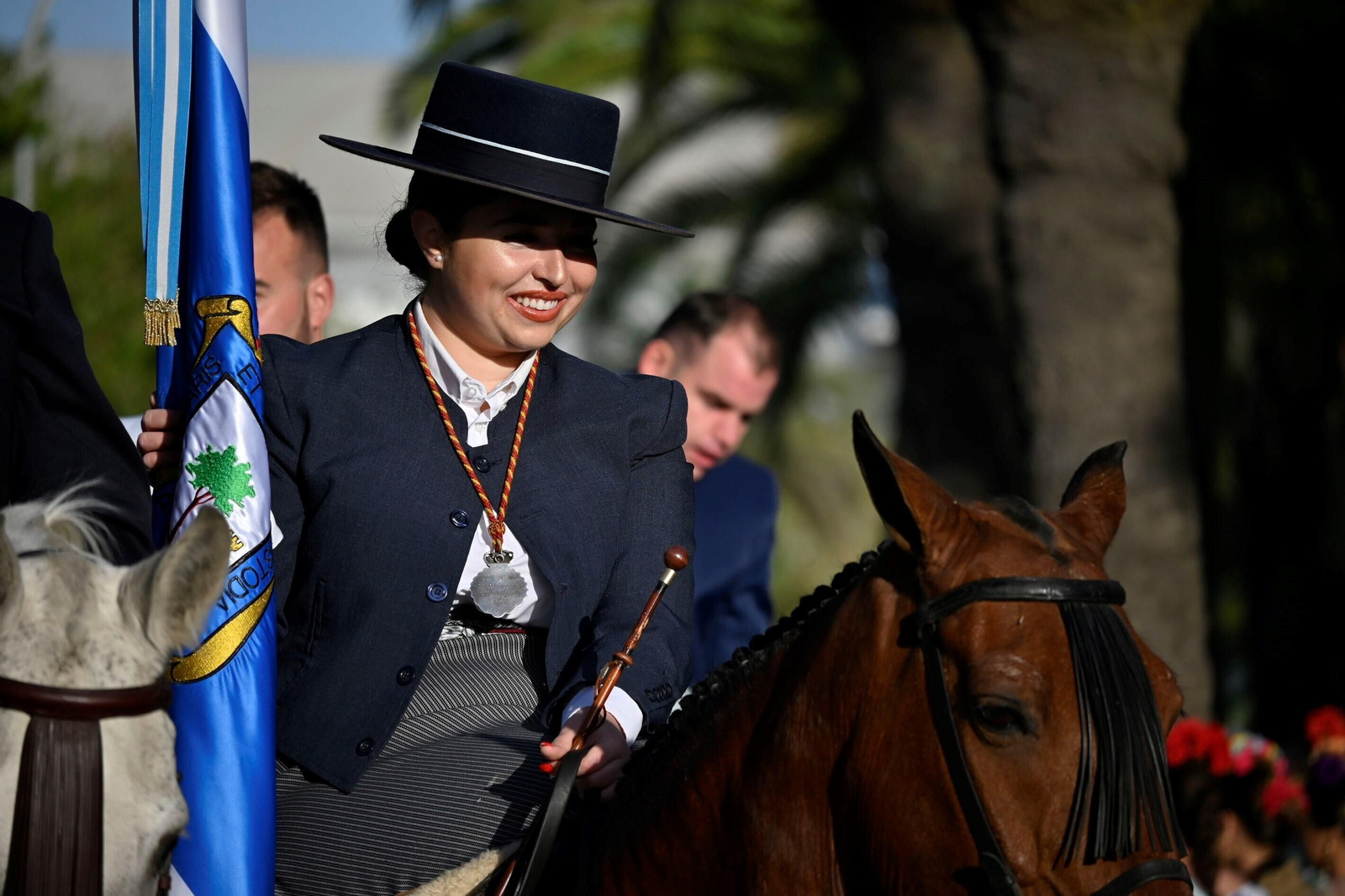 Imágenes de los peregrinos de la Hermandad de Emigrantes en su salida por las calles de Huelva