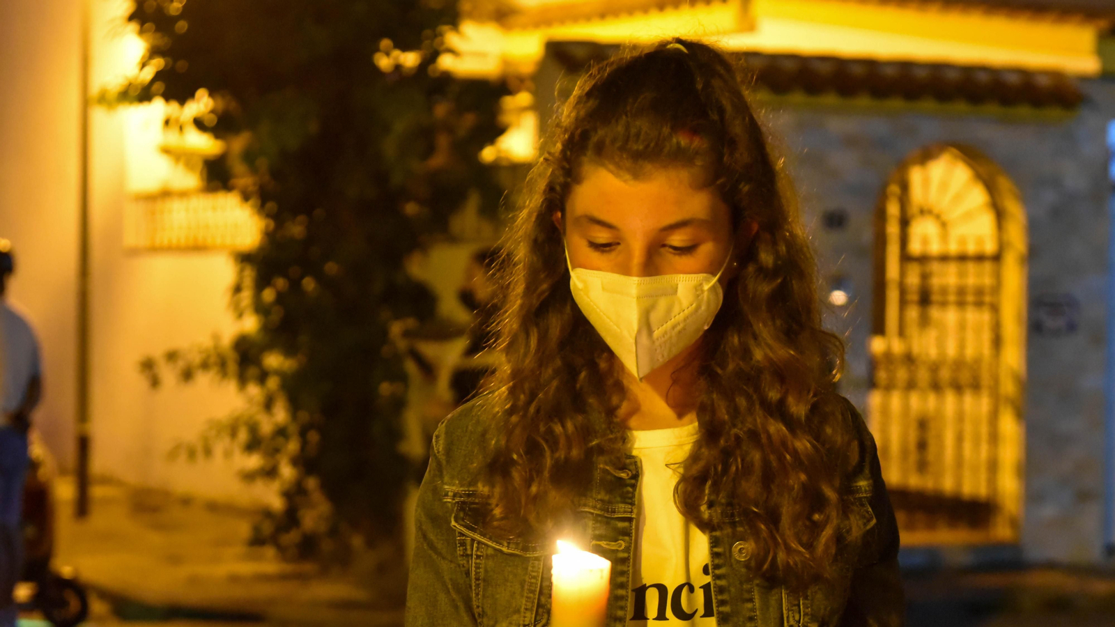 Las fotos de la Virgen de la Salud procesionando en la barriada de San Garcia