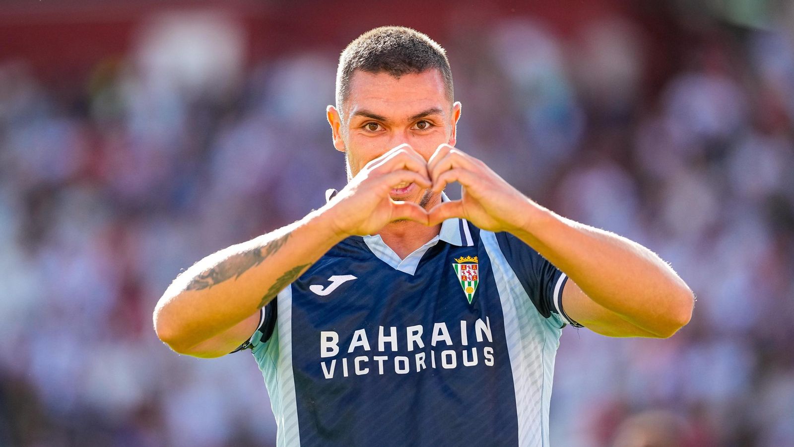 Adri Fuentes celebra su doblete con el Córdoba CF en el Carlos Belmonte.