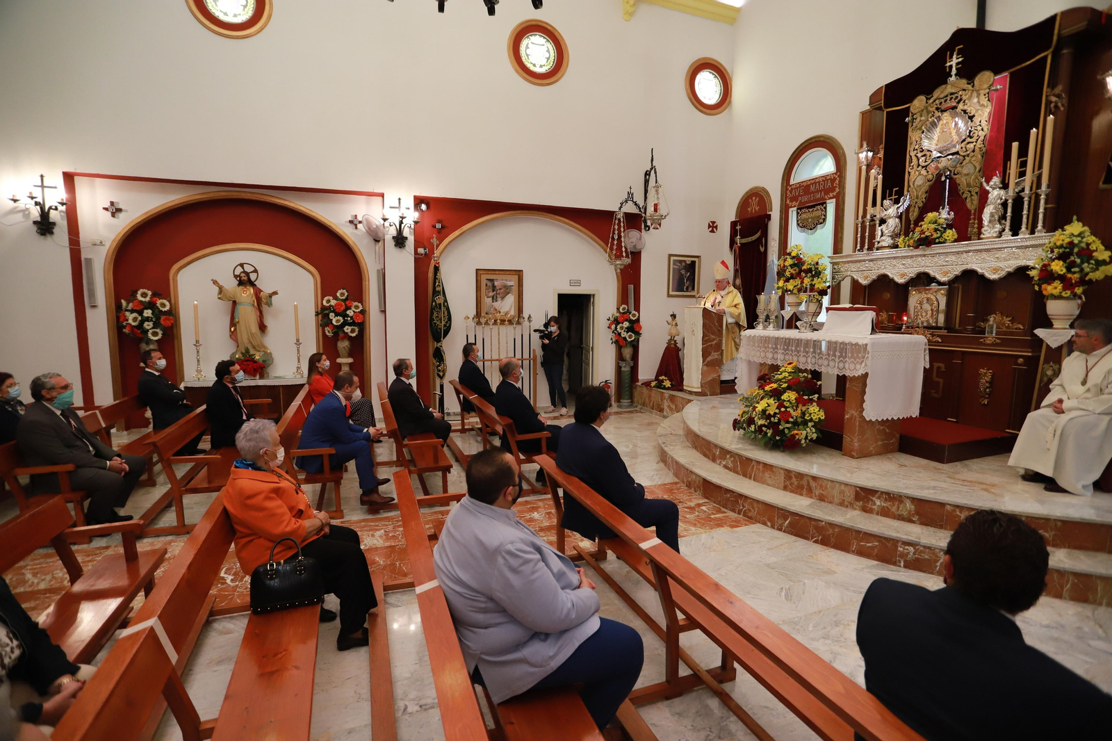 Imágenes de la función principal de Emigrantes, presidida por el obispo de Huelva, José Viaplana Blasco