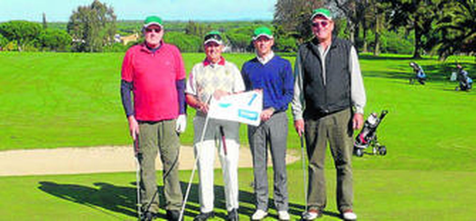 Cuatro de los jugadores participantes en el Trofeo Widex, disputado en Bellavista.