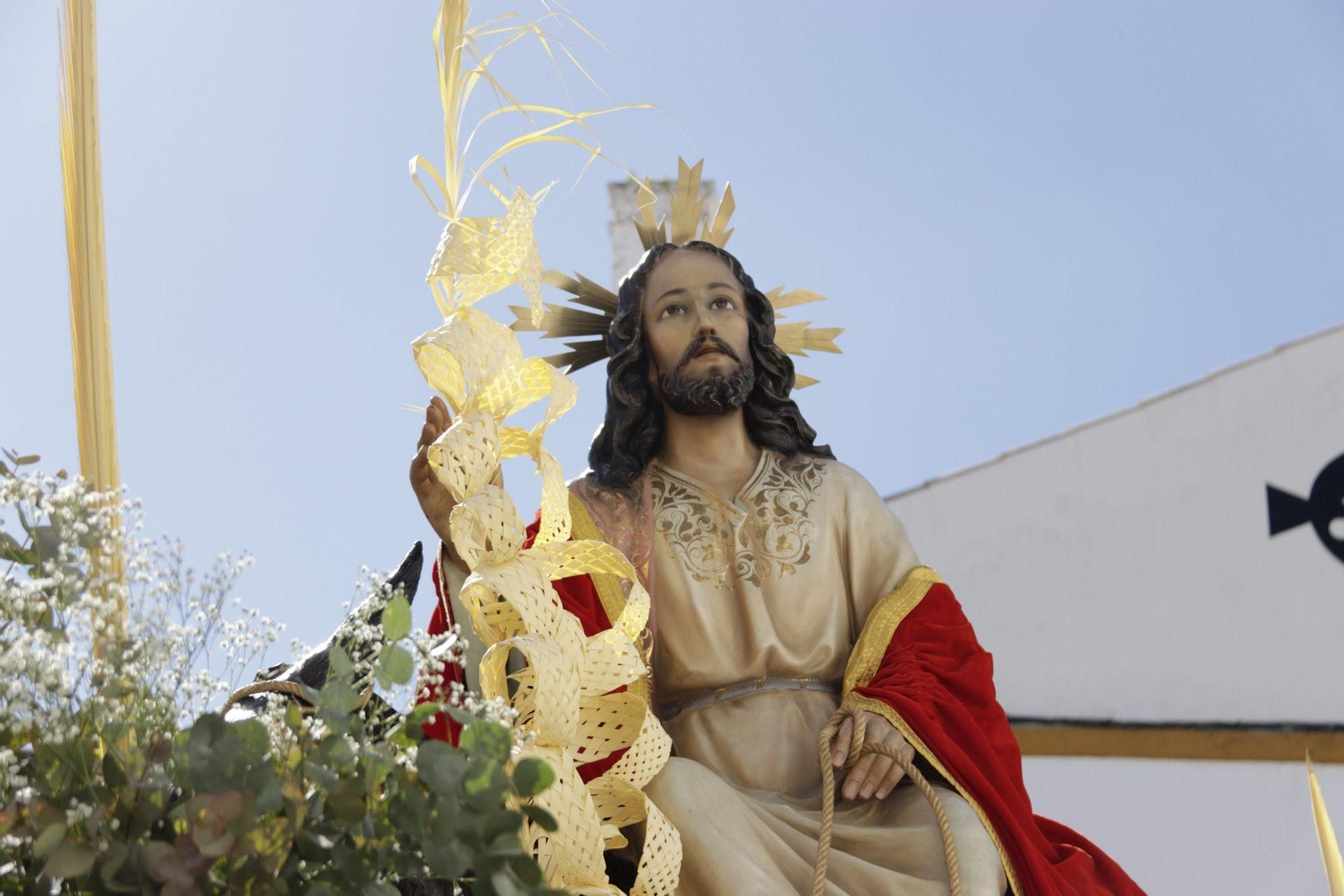 La procesión de la Borriquita en Almodóvar del Río, en imágenes