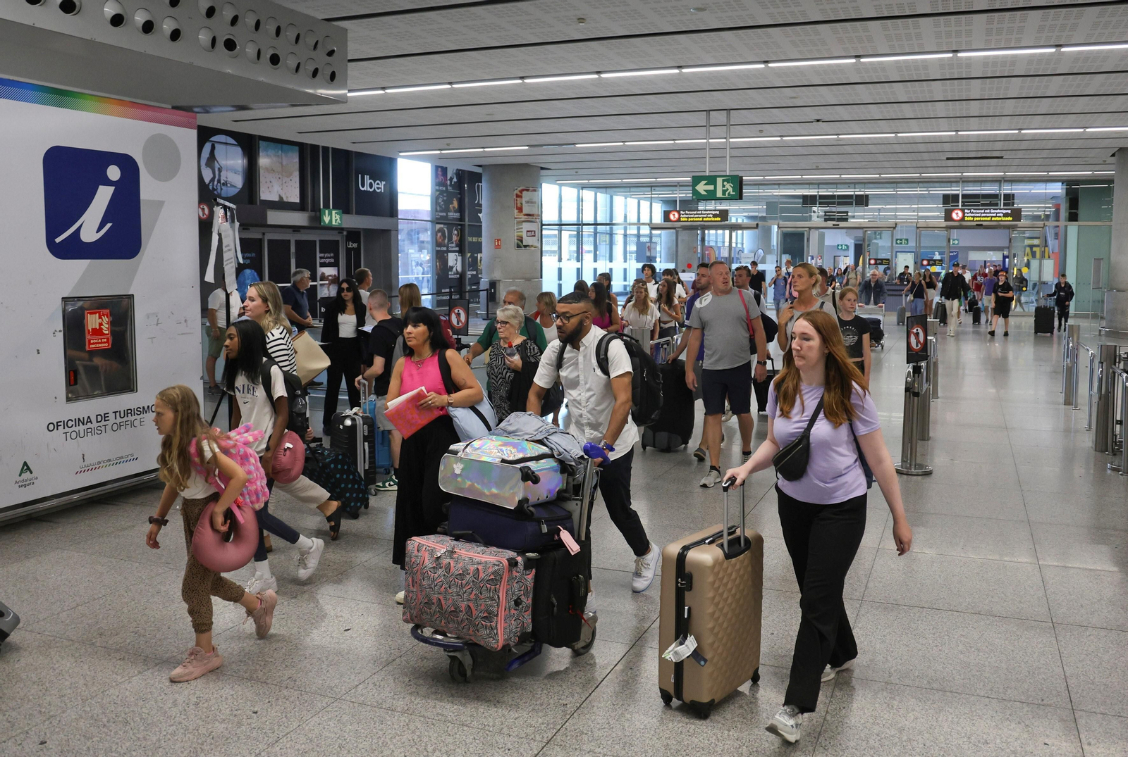 Llegada de viajeros al aeropuerto de Málaga este verano. Llegada de viajeros al aeropuerto de Málaga este verano.