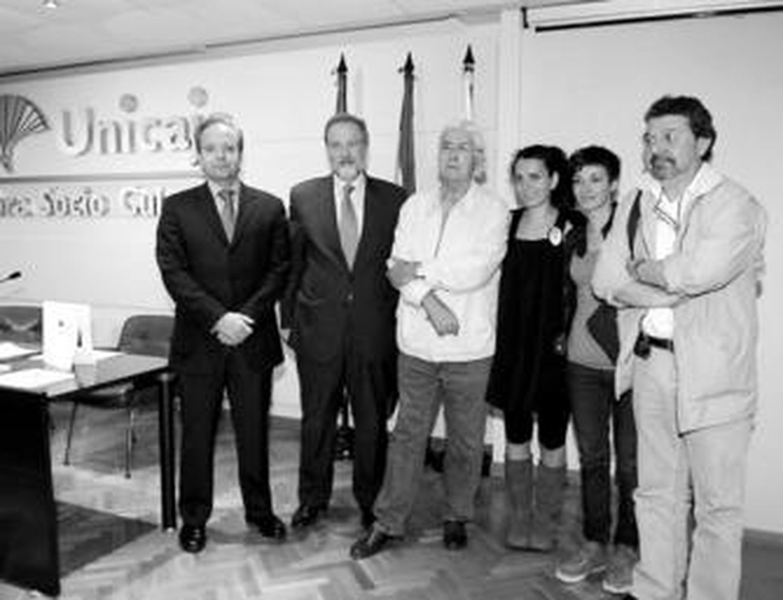 Felipe Faraguna con Francisco Moreno, Carlos Pérez Siquier y los galardonados.