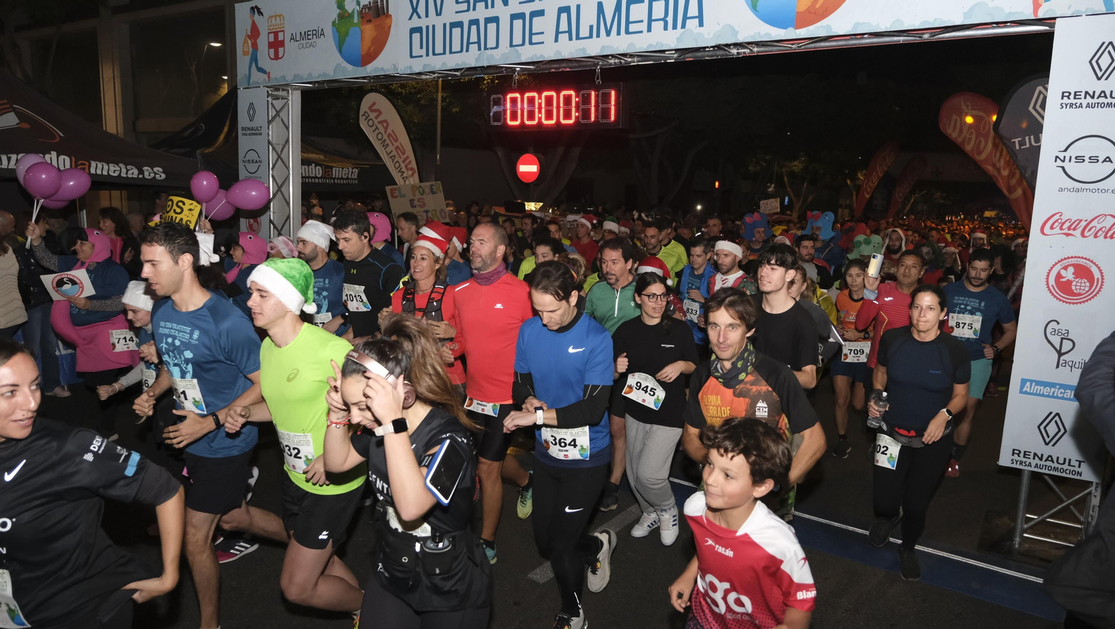 Imágenes de la XIV edición de la San Silvestre de Almería