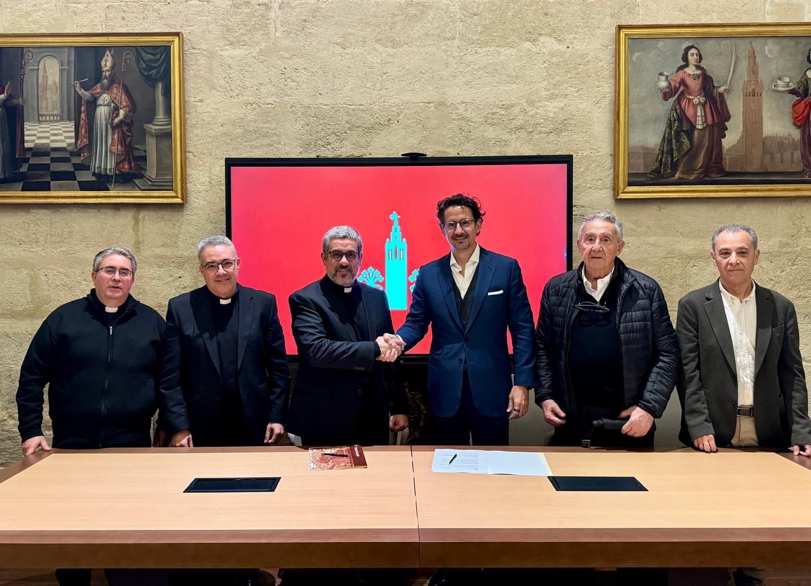 El acto de firma del convenio entre el Cabildo de la Catedral y Ayesa.