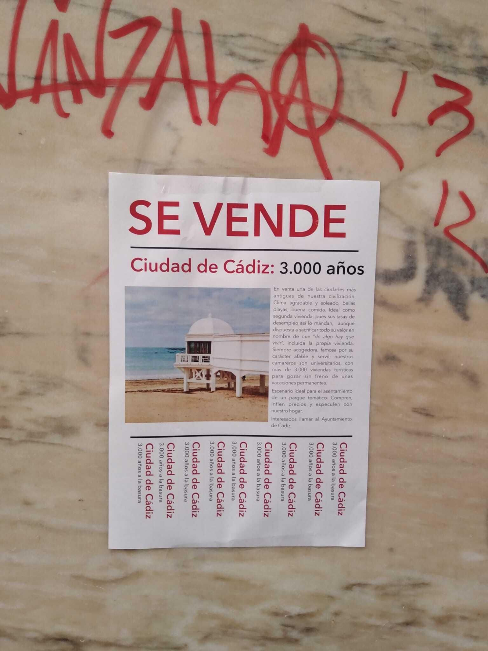 Un cartel aparecido recientemente en las calles de Cádiz.