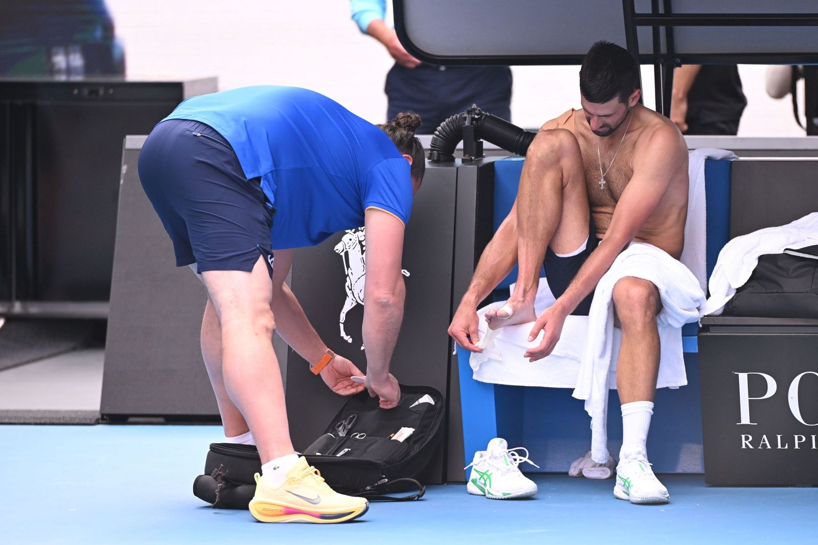 Las fotos de la retirada de Musetti ante Djokovic y del resto de cuartos de final