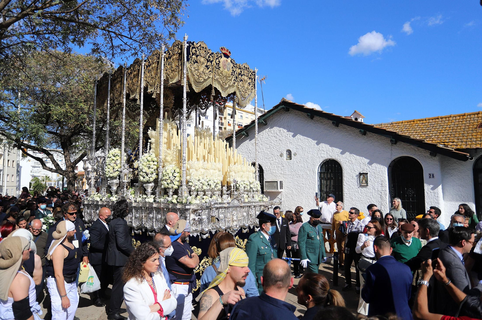 Imágenes de La Victoria en su salida procesional y su recorrido por el Barrio Obrero