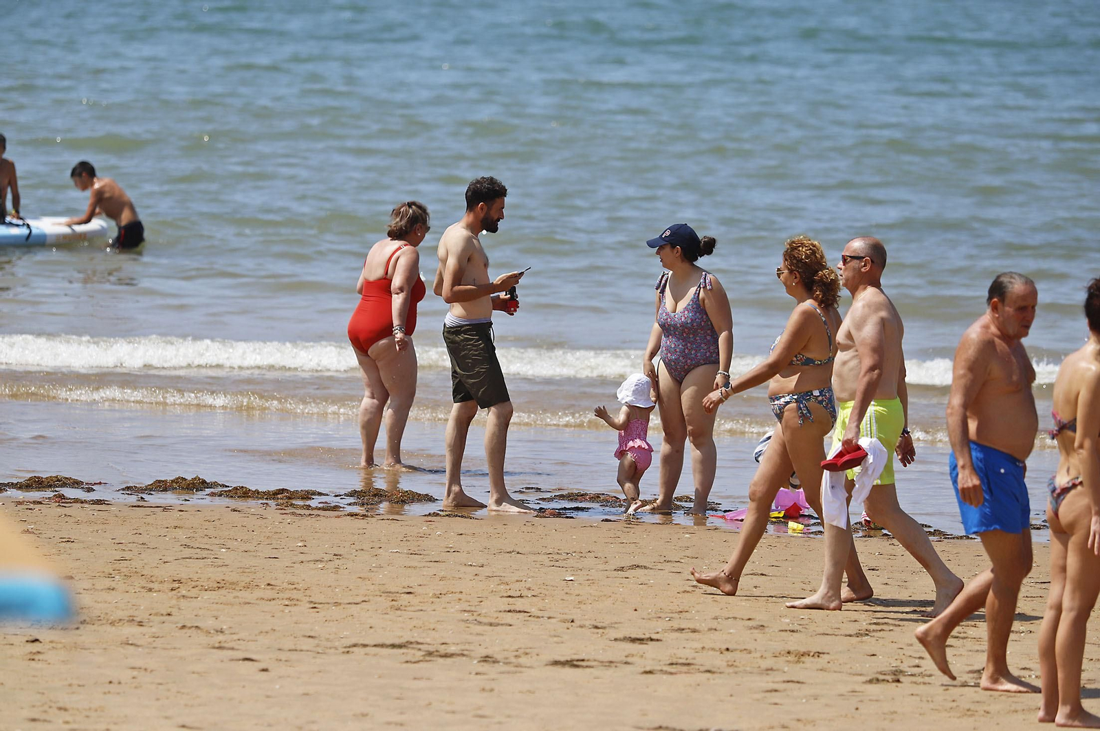 Las imágenes de la jornada de domingo en las playas de Huelva