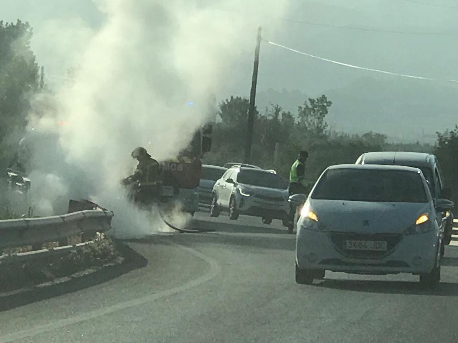Arde una moto en la carretera entre Granada y Vegas del Genil