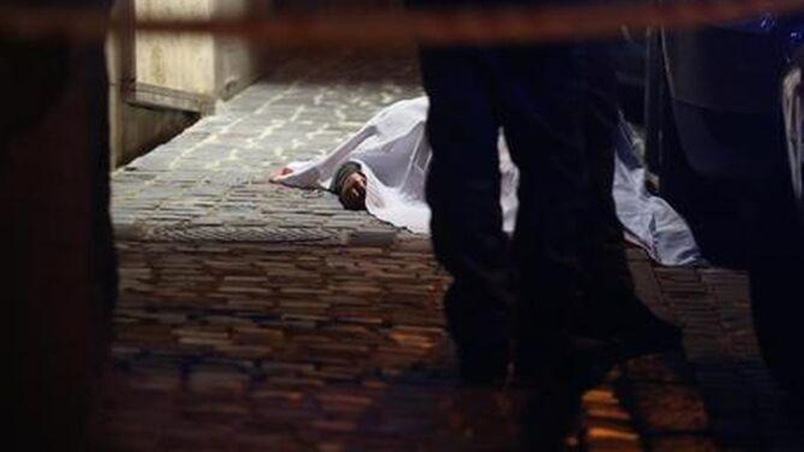 La víctima, en el suelo de Nápoles.