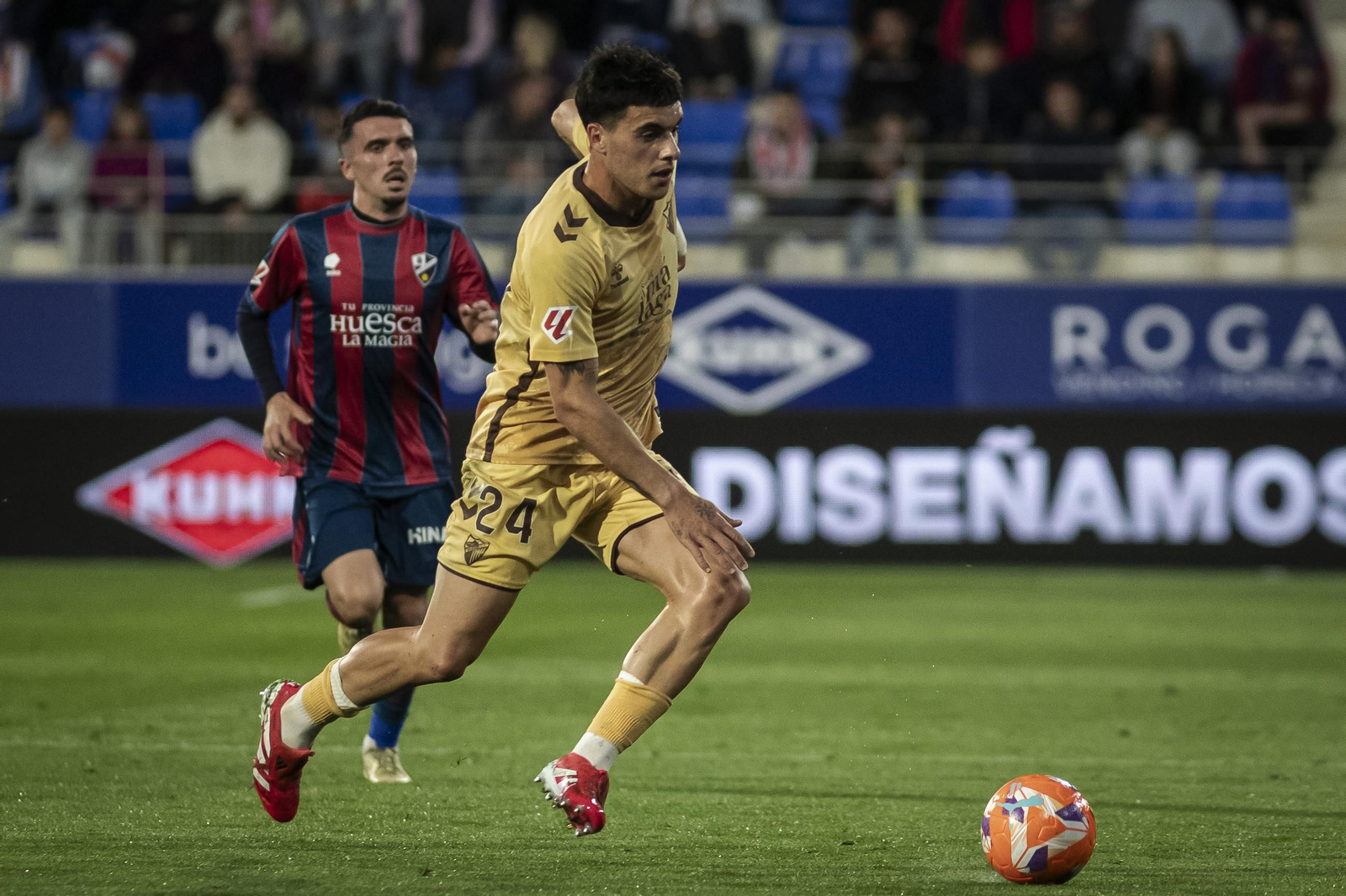 El Huesca-Málaga CF, en fotos