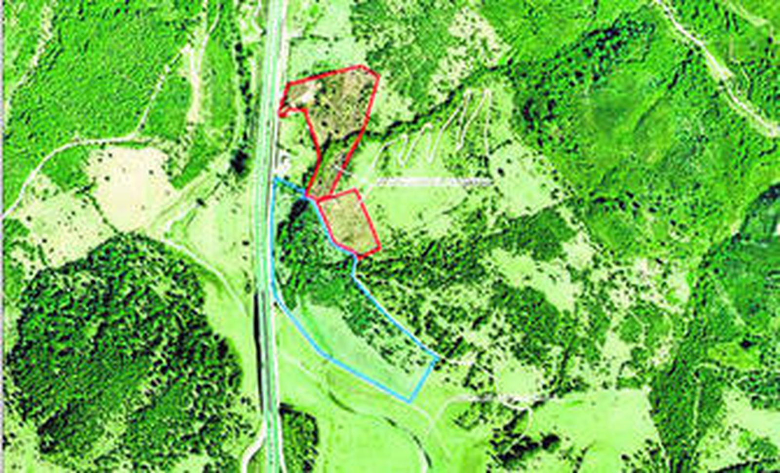 Vista aérea de la zona en la que el Ayuntamiento ha solicitado los terrenos, a la derecha del viaducto que cruza el embalse de Charco Redondo.