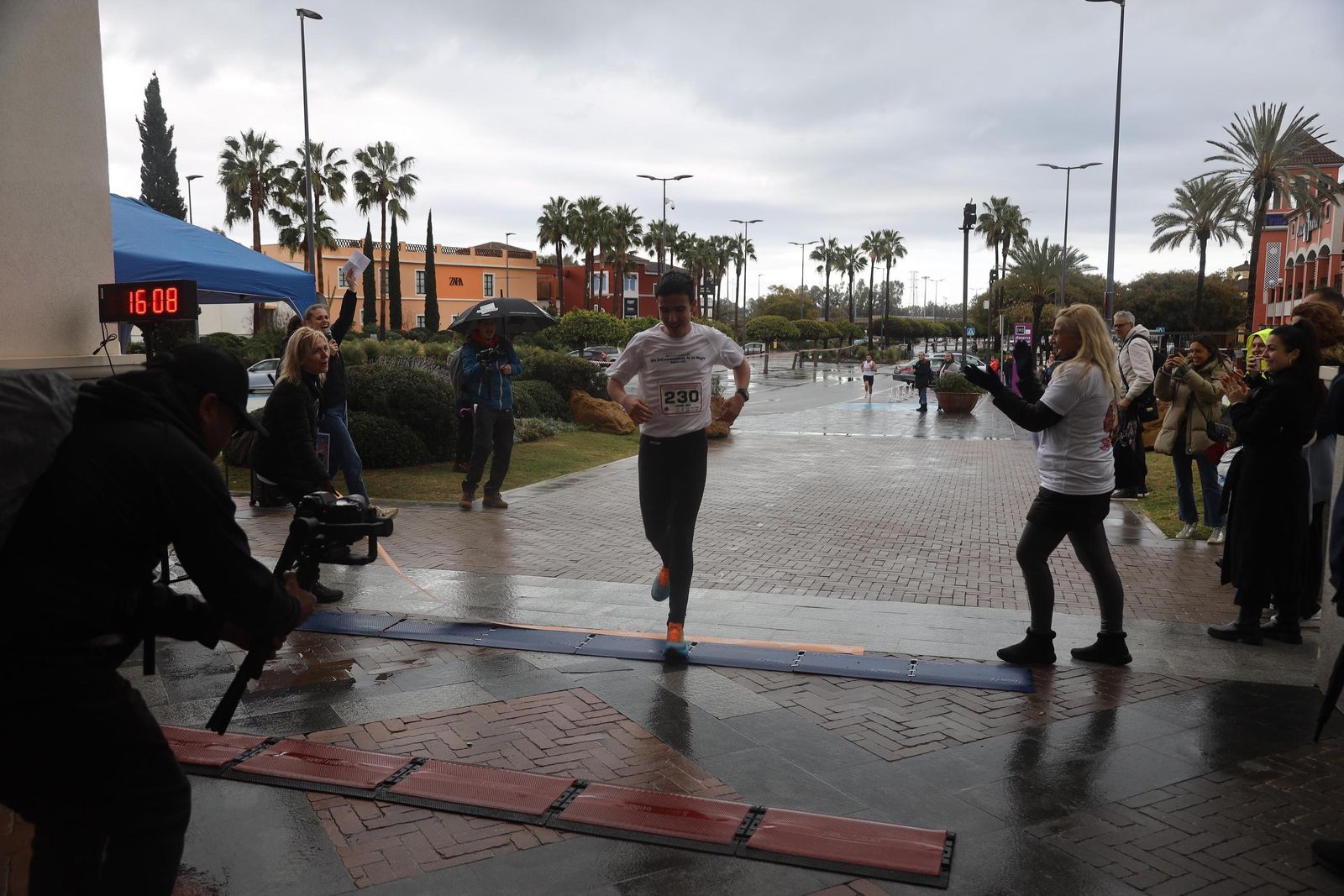 La Carrera por el Día Internacional de la Mujer en Málaga, en fotos