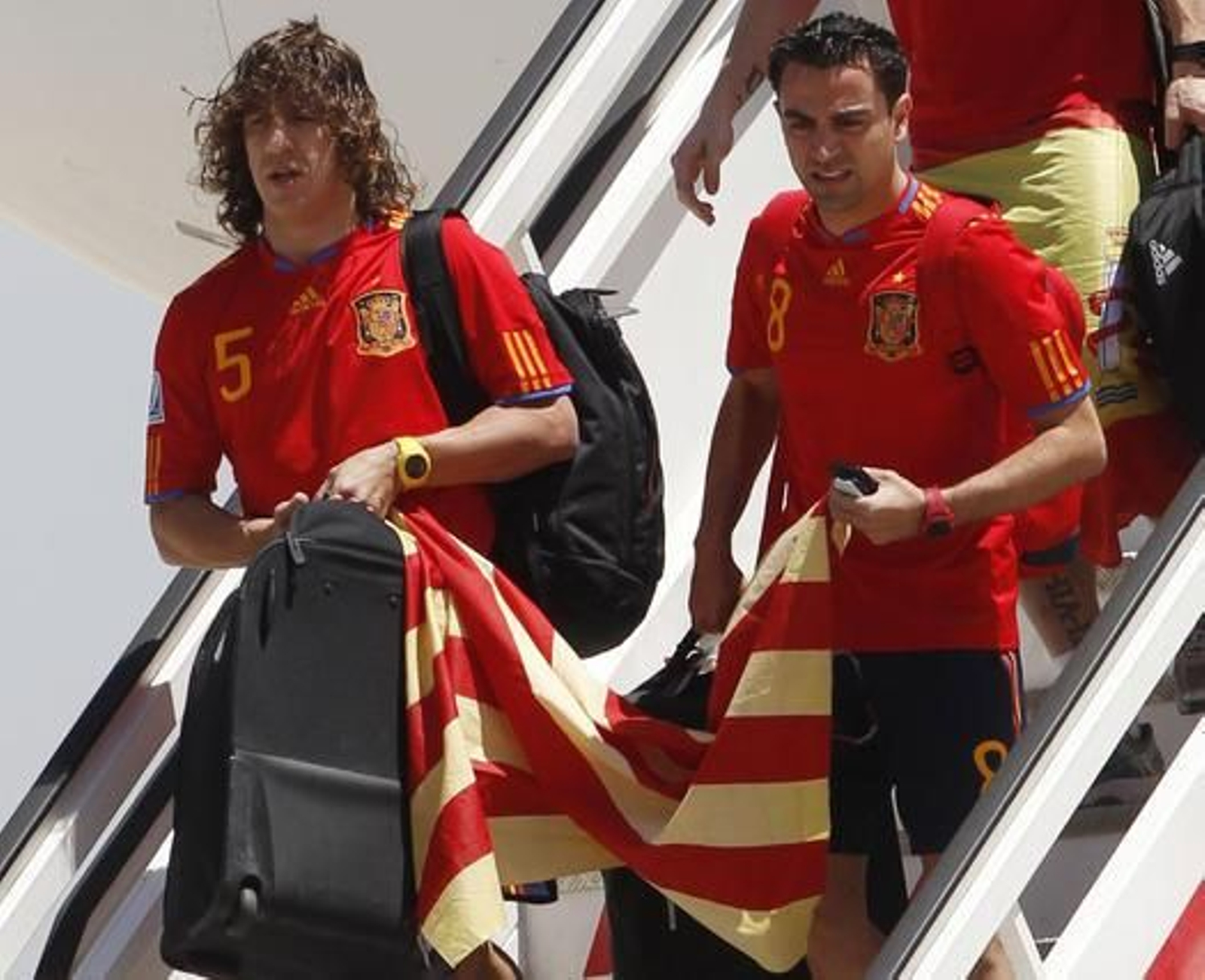Los campeones del mundo llegan al aeropuerto de Barajas. / Reuters