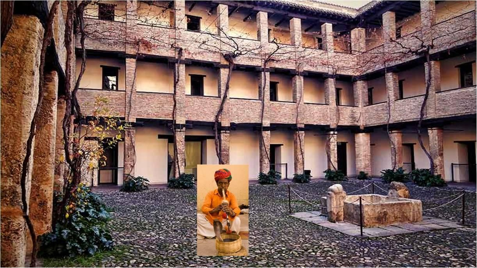 El encantador de serpientes en el Corral del Carbón