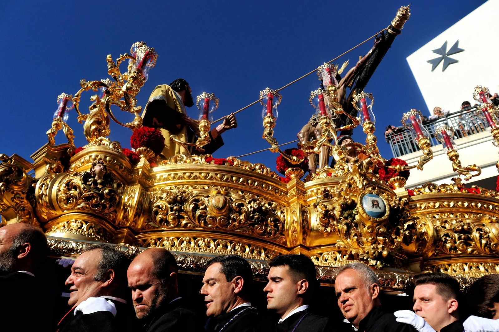 Fusionadas en su procesión del Miércoles Santo en Málaga, en fotos