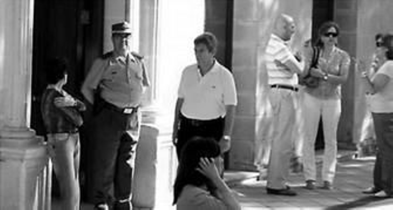 Miguel Gutiérrez Palmero, en el centro, antes de entrar a juicio a mediados de junio pasado. Miguel Gutiérrez Palmero, en el centro, antes de entrar a juicio a mediados de junio pasado.