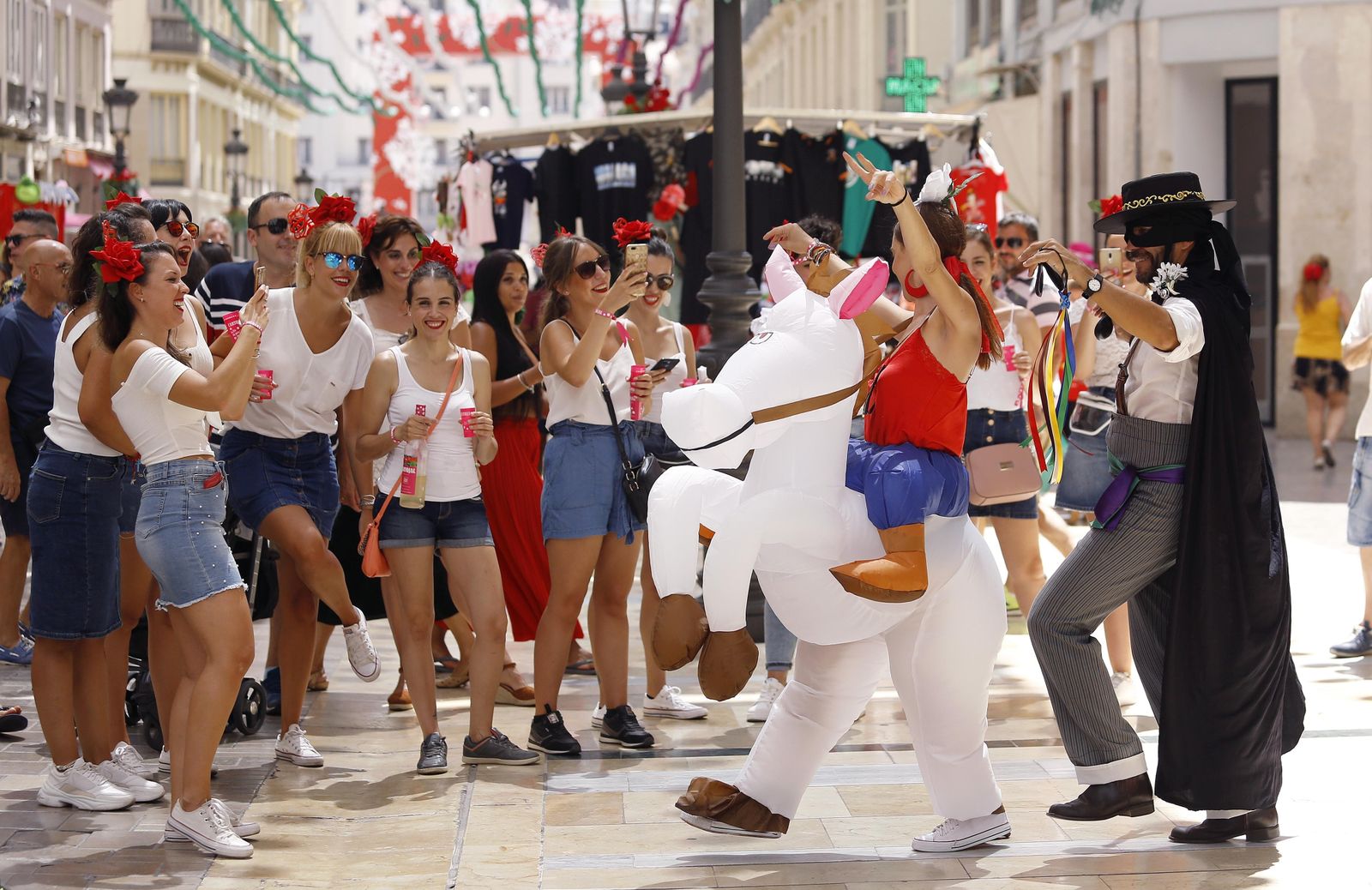 Fotos del último día de Feria de Málaga en el centro