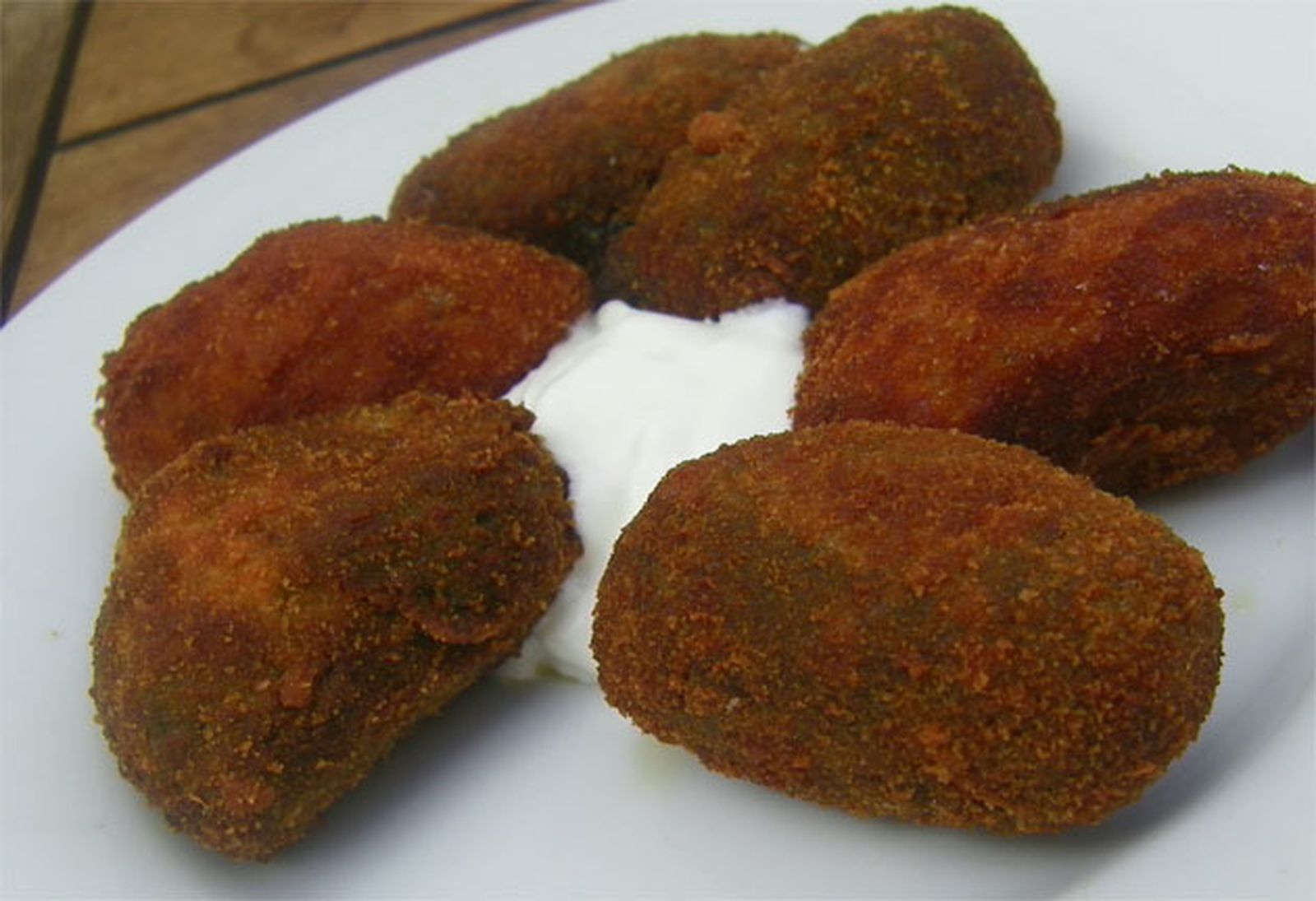 Croquetas de choco en su tinta