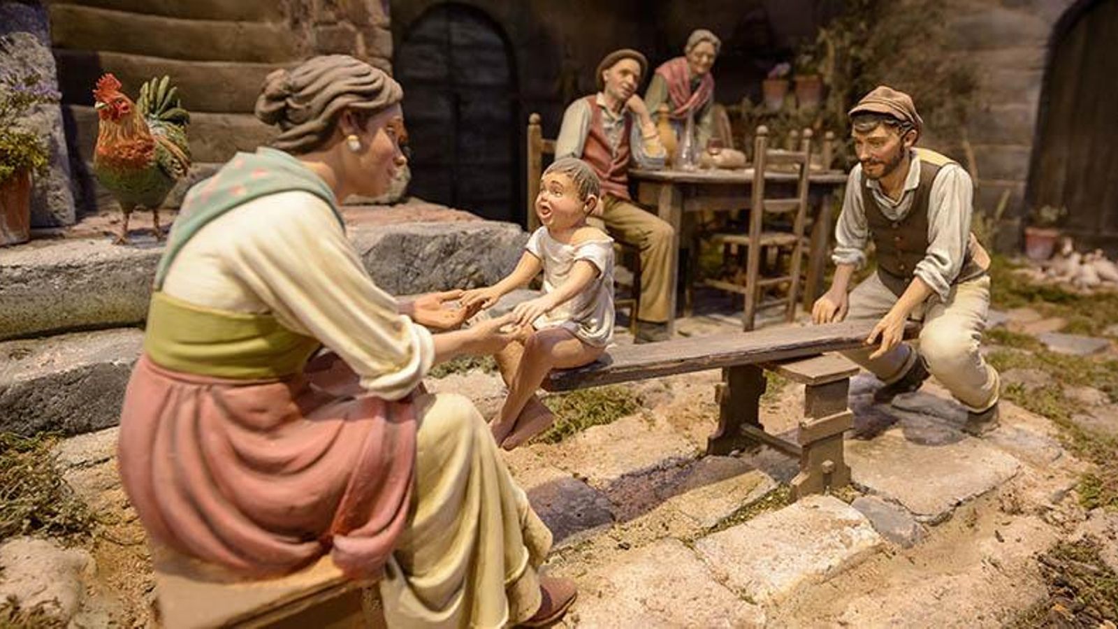Una familia en un columpio. Una familia en un columpio.