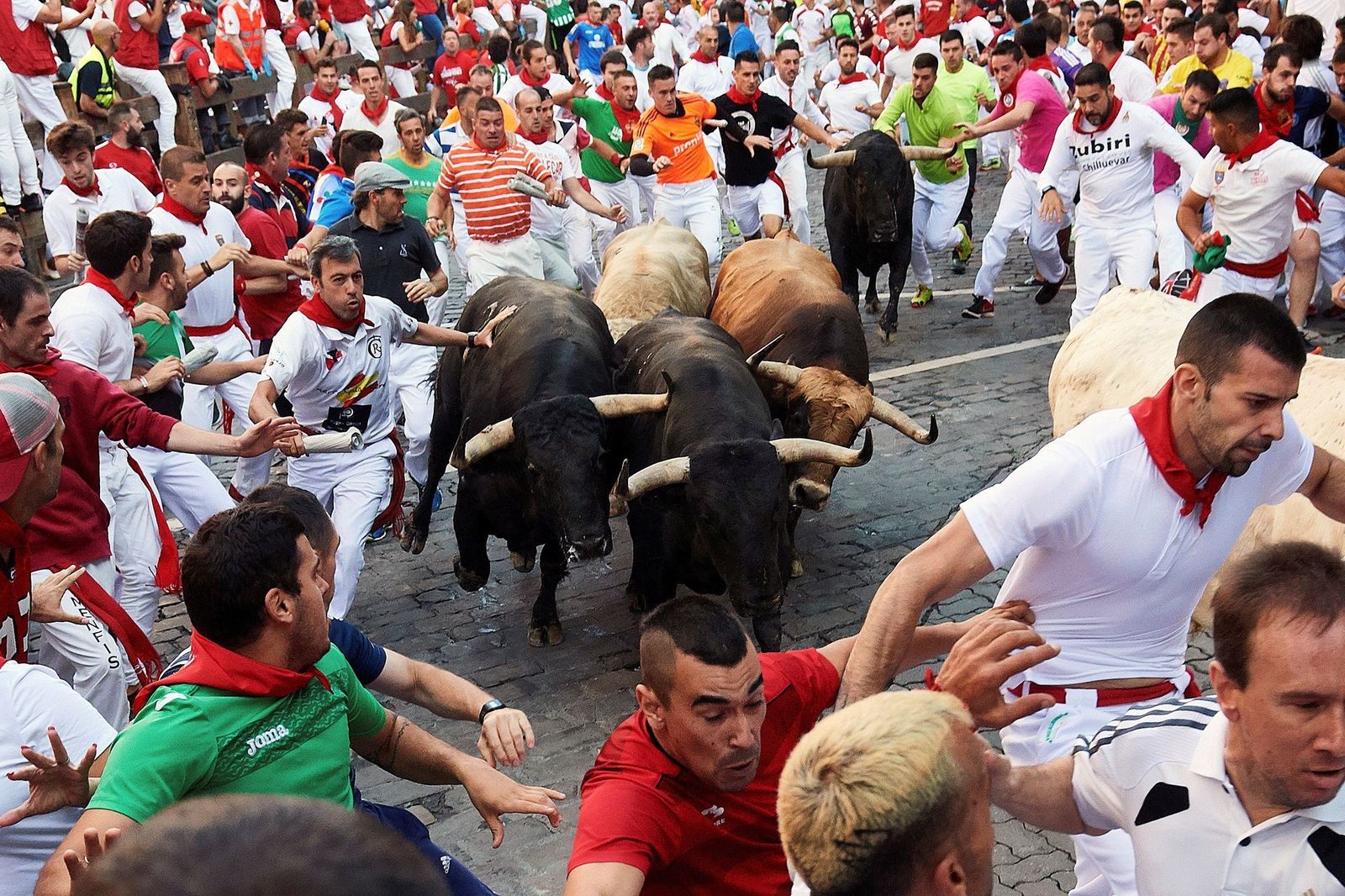 El quinto encierro de los Sanfermines, en imágenes