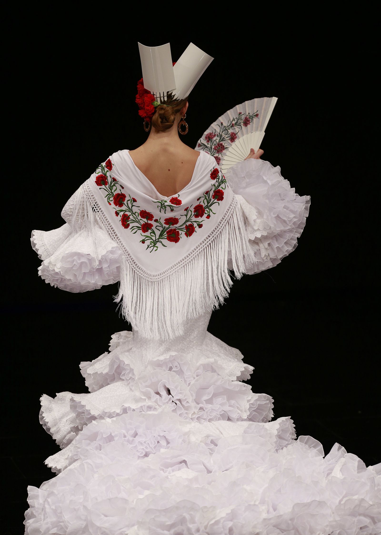 Desfile de Luis Fernández.