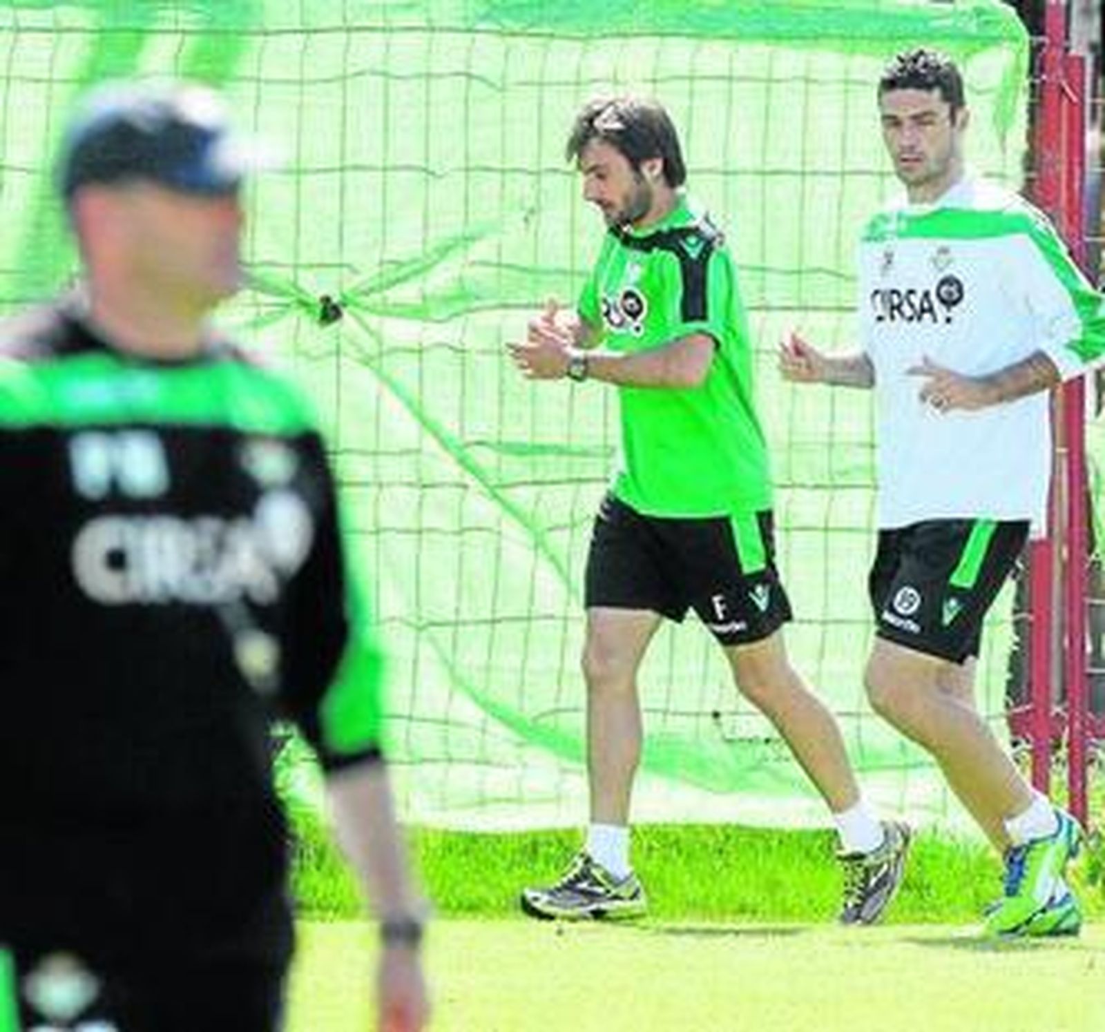 Jorge Molina realiza carrera junto al recuperador, Fran Molano.