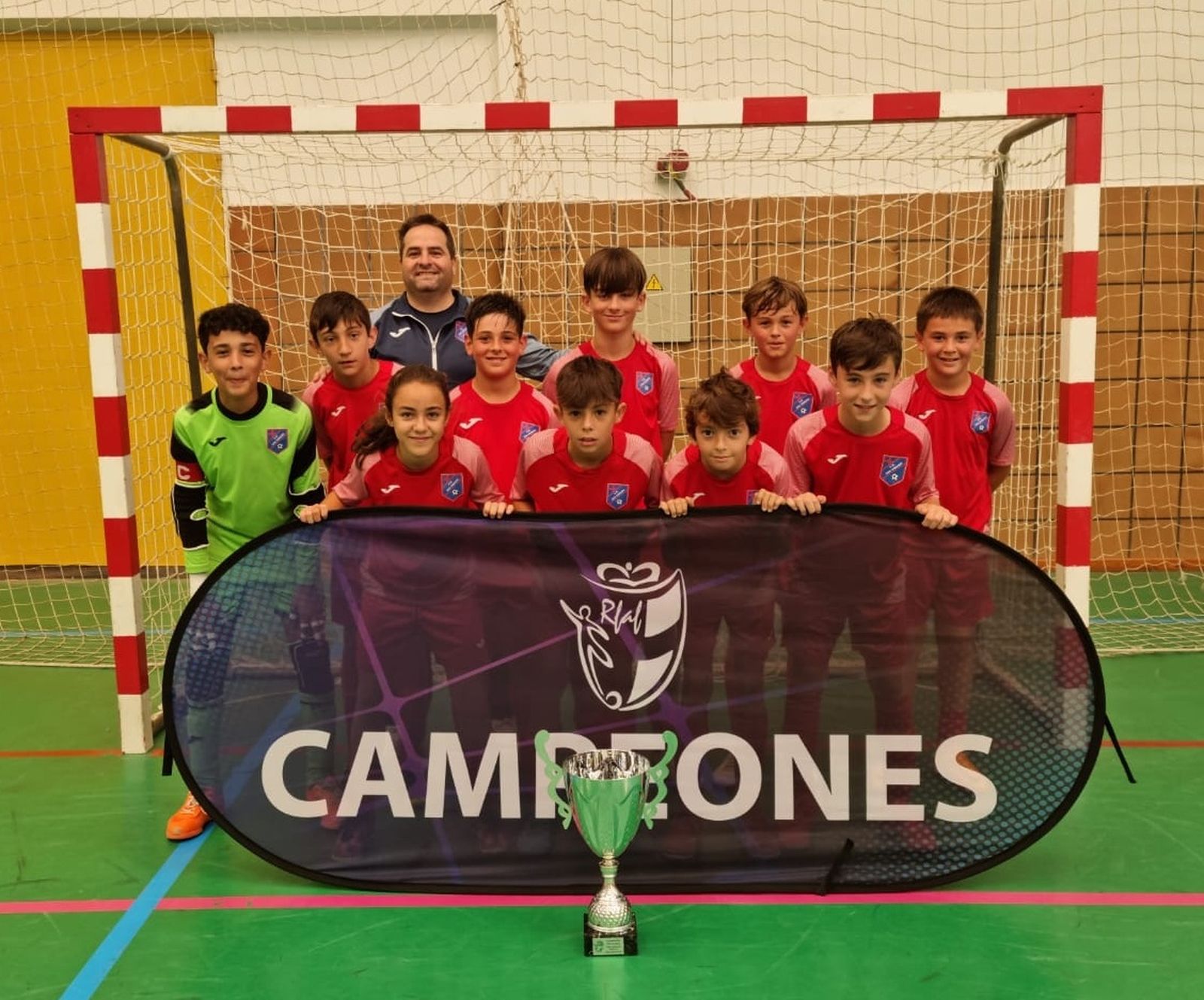 Imágenes de los equipos campeones de Almería de fútbol y fútbol sala