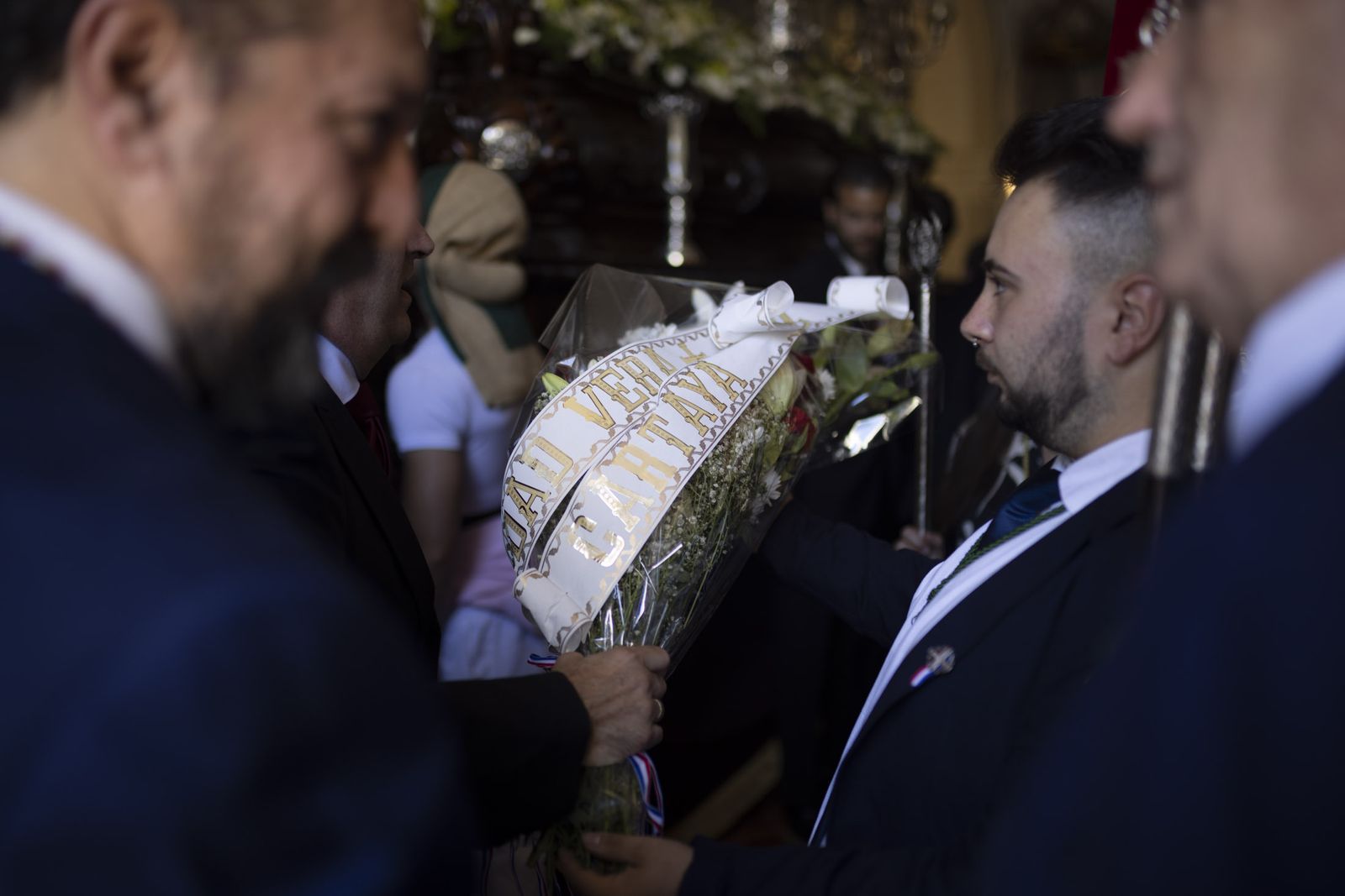 Imágenes de la salida extraordinaria de La Borriquita por las calles de Huelva