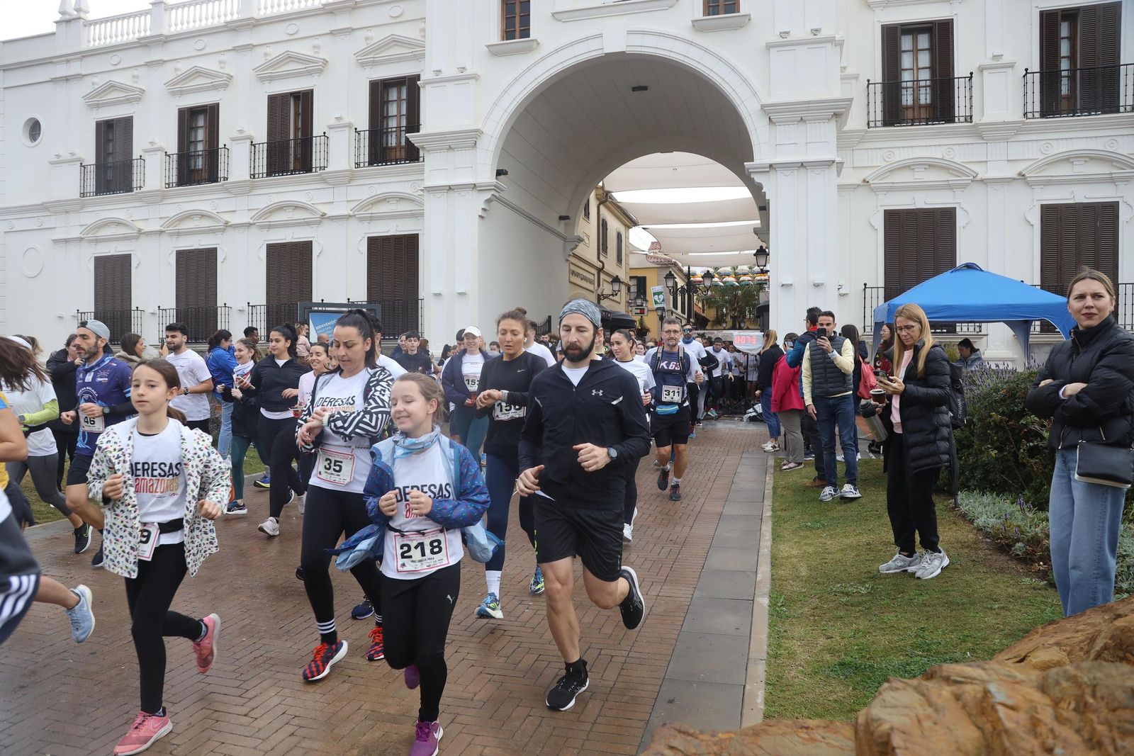 La Carrera por el Día Internacional de la Mujer en Málaga, en fotos