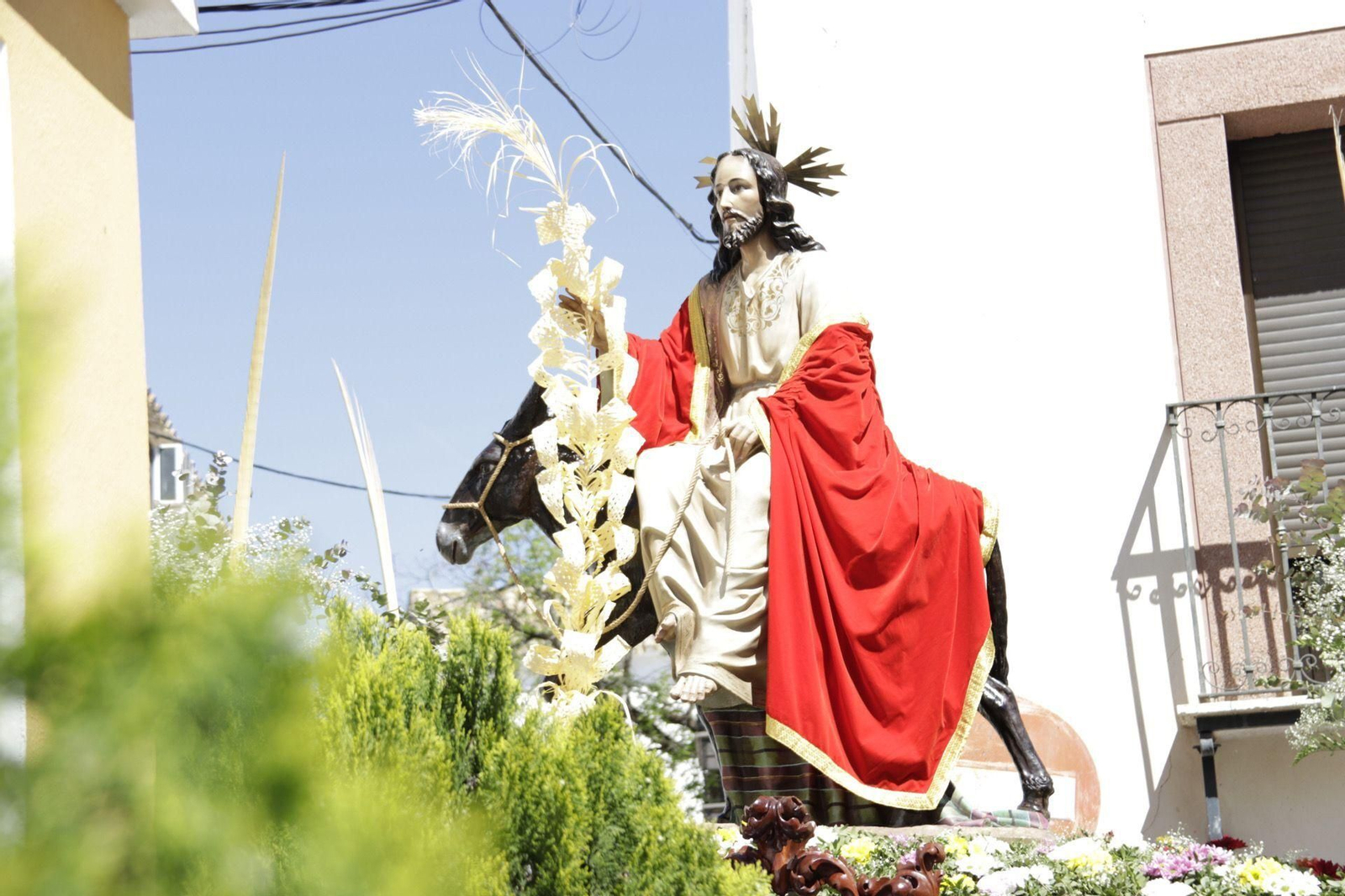 La procesión de la Borriquita en Almodóvar del Río, en imágenes