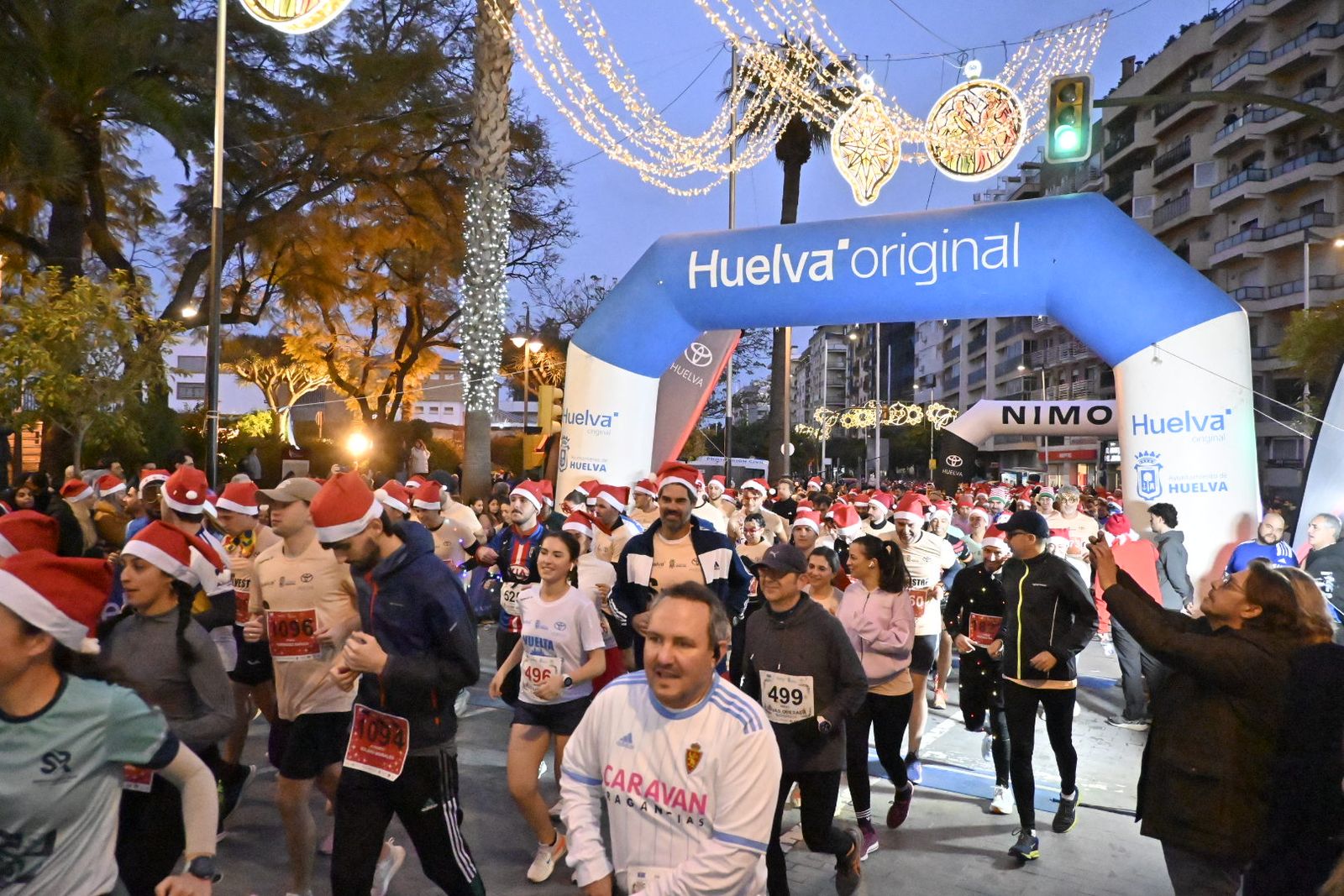 Búscate en las mejores fotografías de la San Silvestre de Huelva 2025