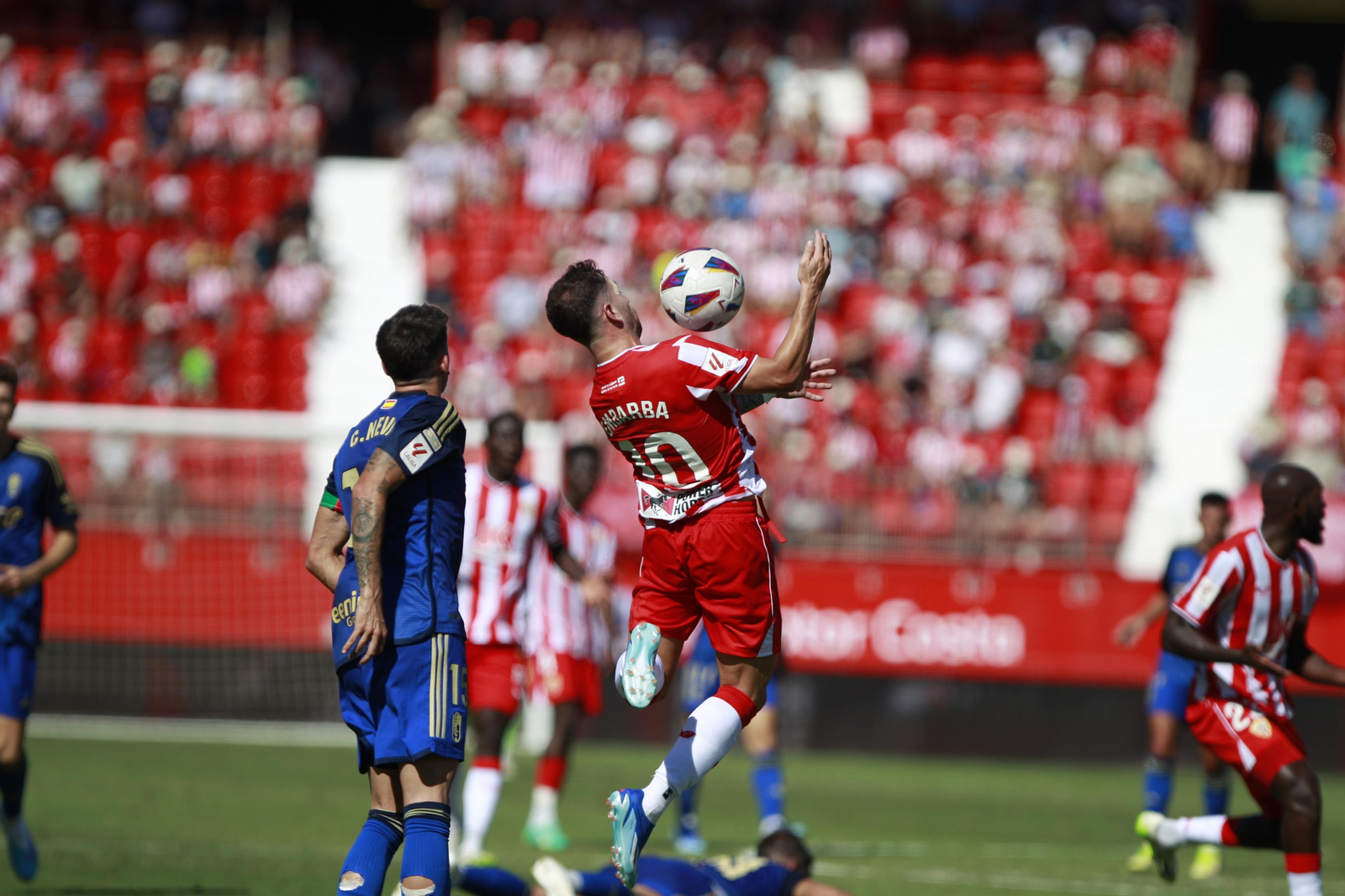 Imágenes del empate a 3 de la U.D. Almería y el Granada C.F.