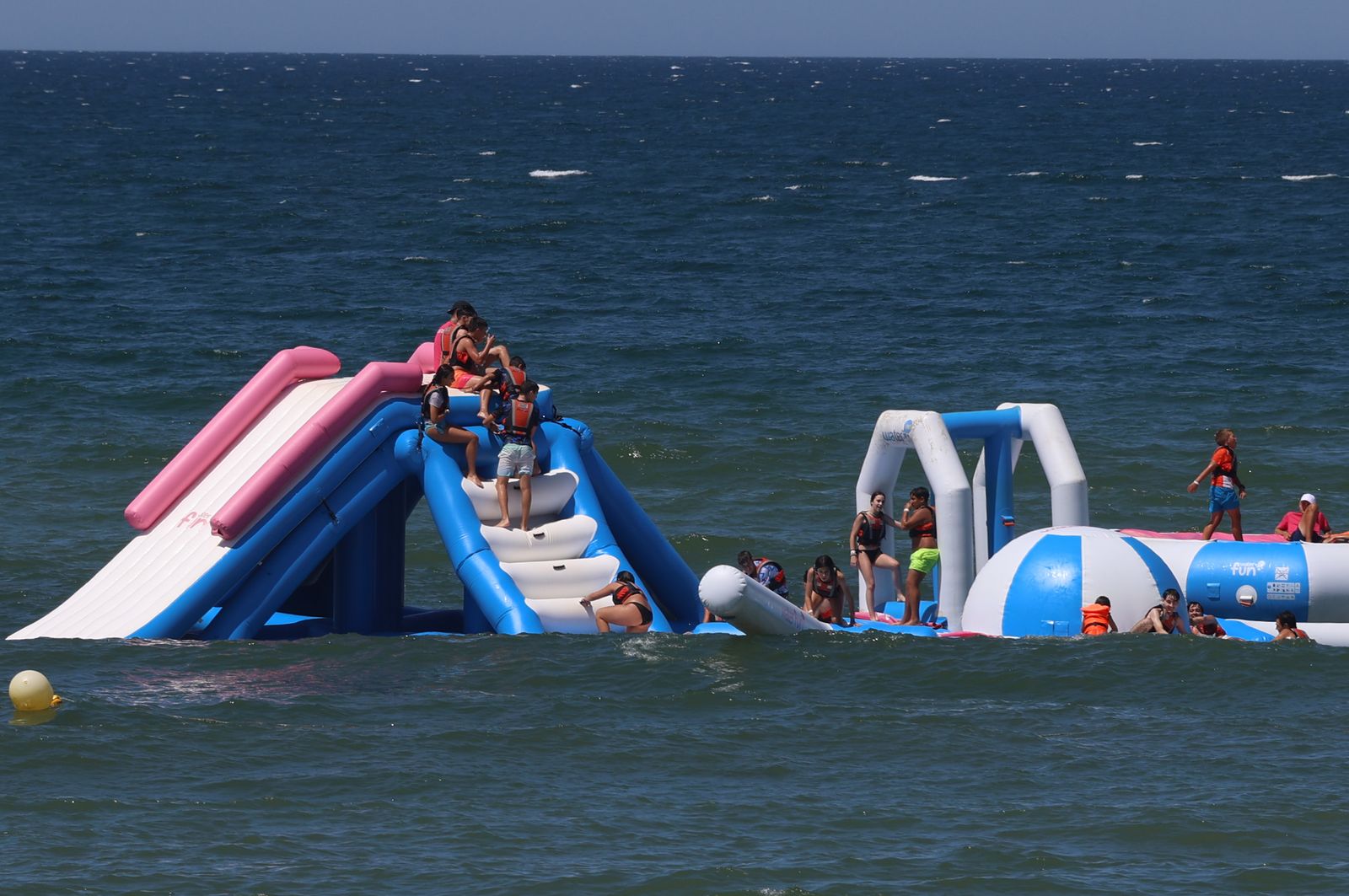 Imágenes de una mañana de calor y playa en Matalascañas