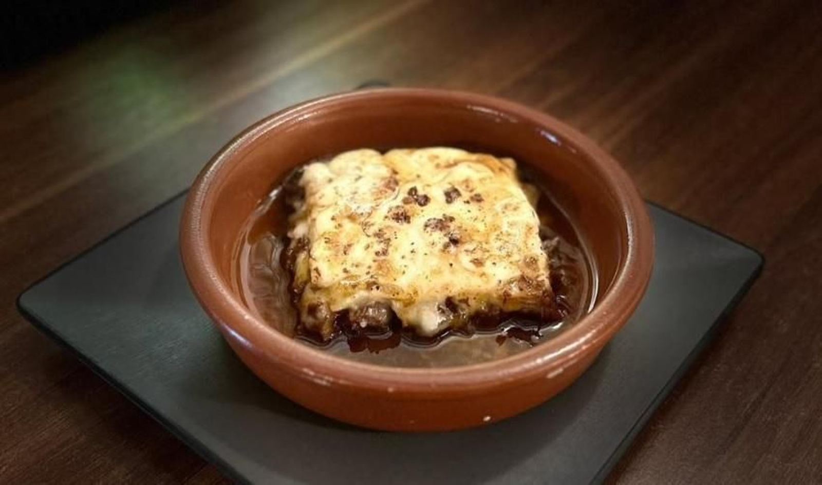 Plaza Colón Vinos y Tapas - Lasaña vegetal en salsa de PX