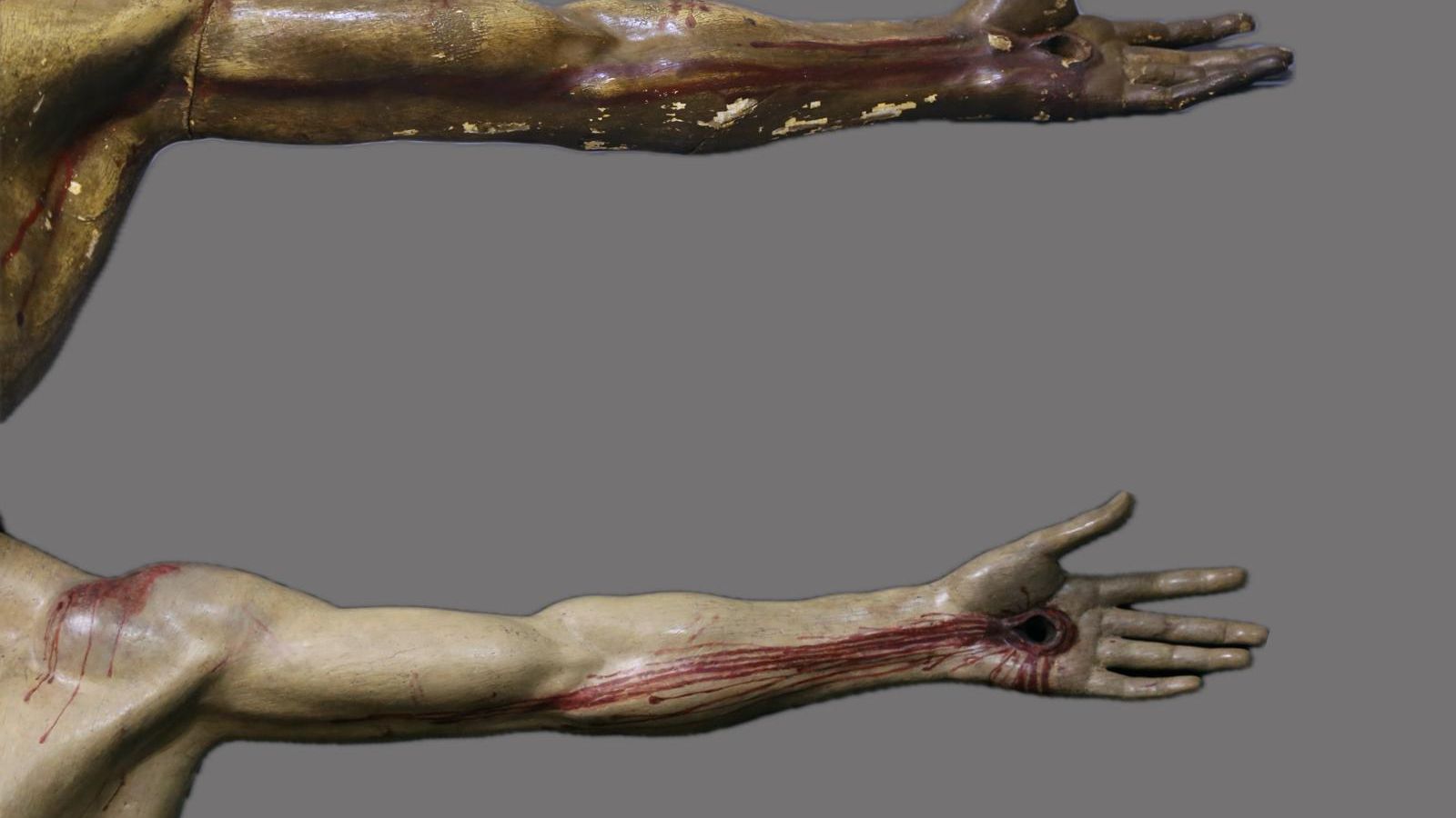 El brazo izquierdo del crucificado