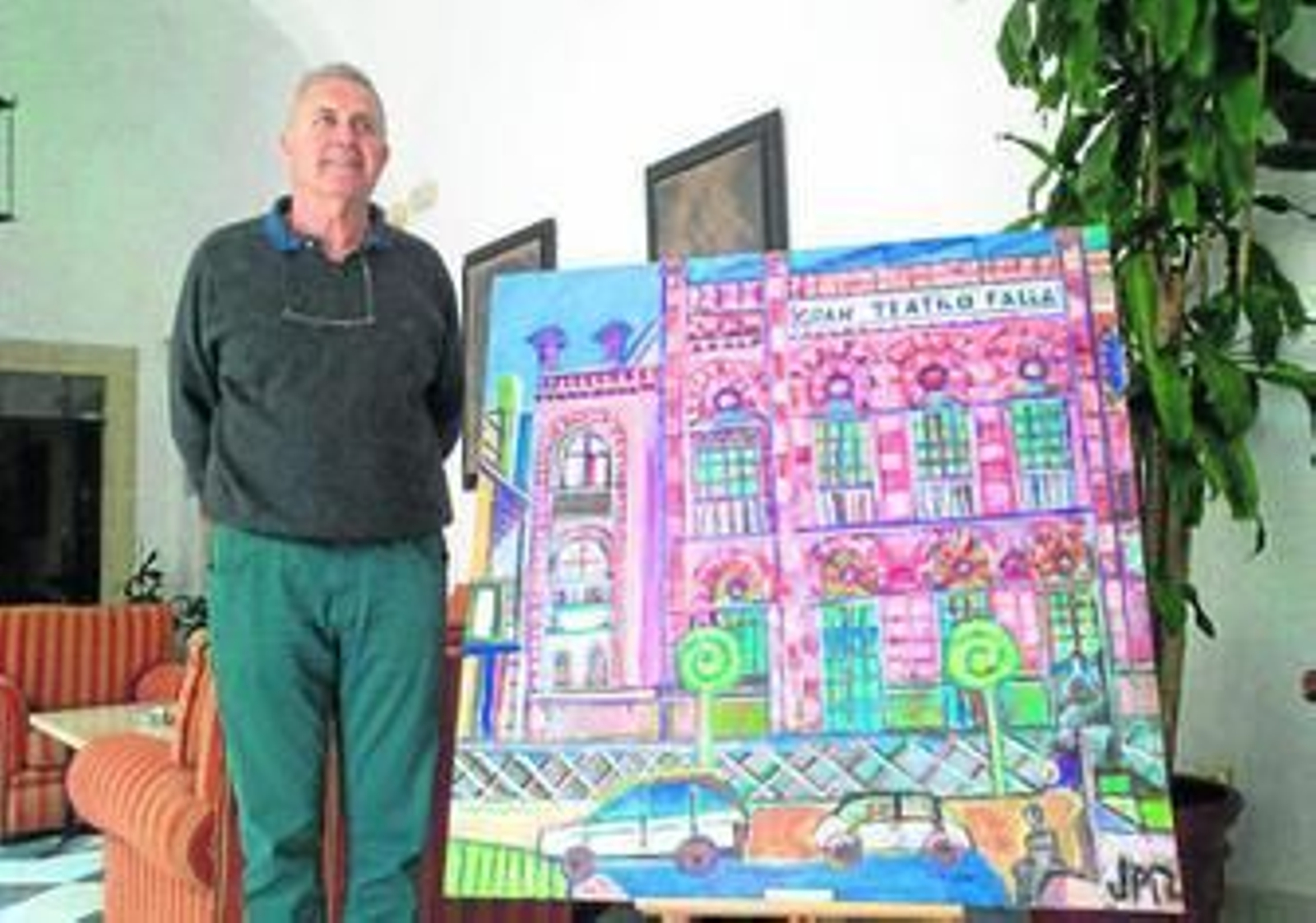El pintor José Manuel Paredes, ante uno de sus cuadros en el que se recrea la fachada del Gran Teatro Falla.