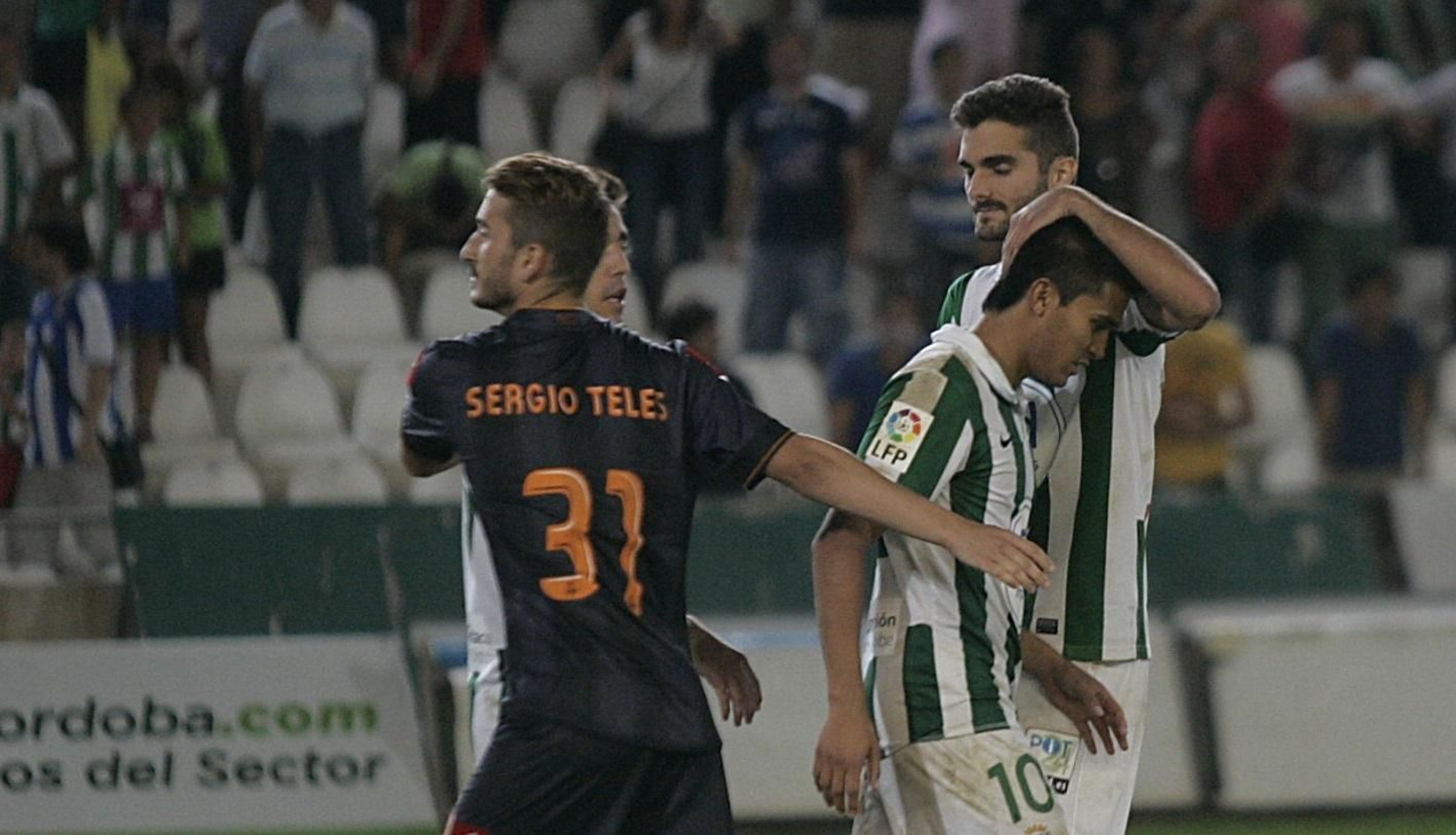 Fran Cruz consuela a Uli Dávila tras el pase copero del Deportivo en 2013.