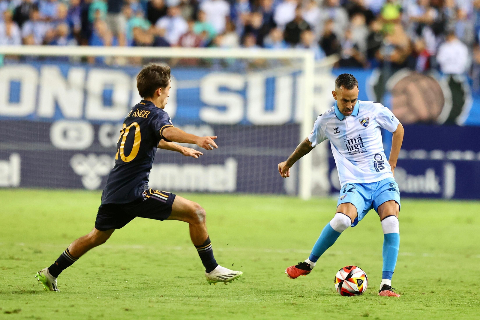 El Málaga CF - Real Madrid Castilla, en imágenes