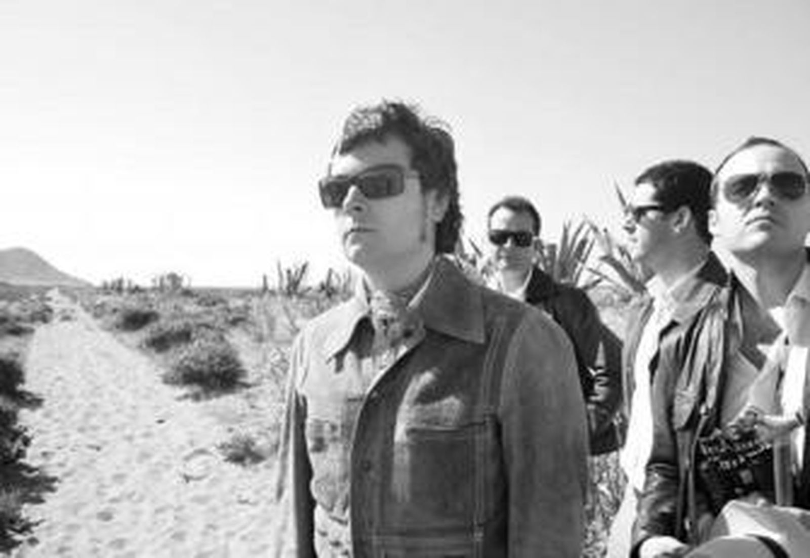 Los componentes de Profesor Popsnuggle en una foto de promoción.