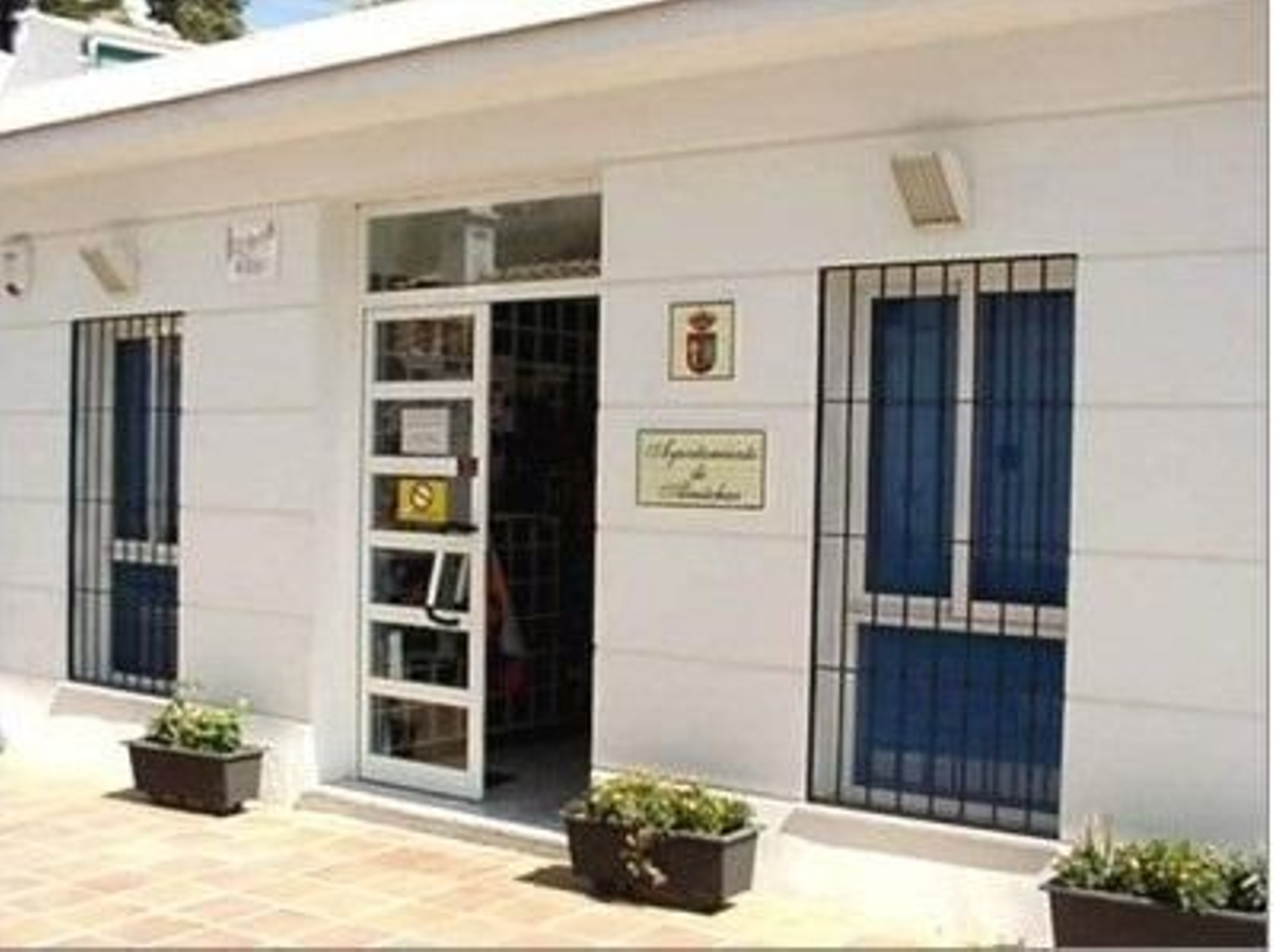 El Ayuntamiento de Almáchar.