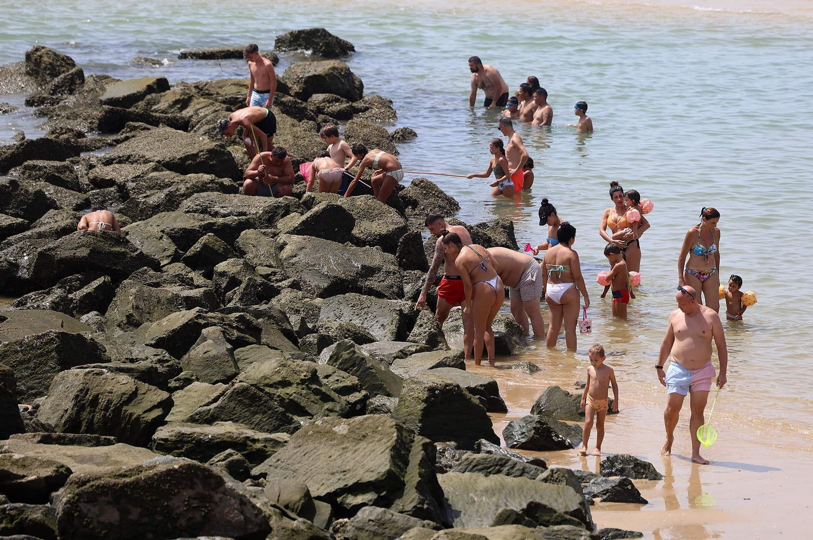 Imágenes del caluroso día en la playa de Matalascañas