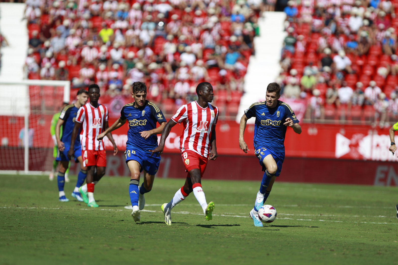 Imágenes del empate a 3 de la U.D. Almería y el Granada C.F.
