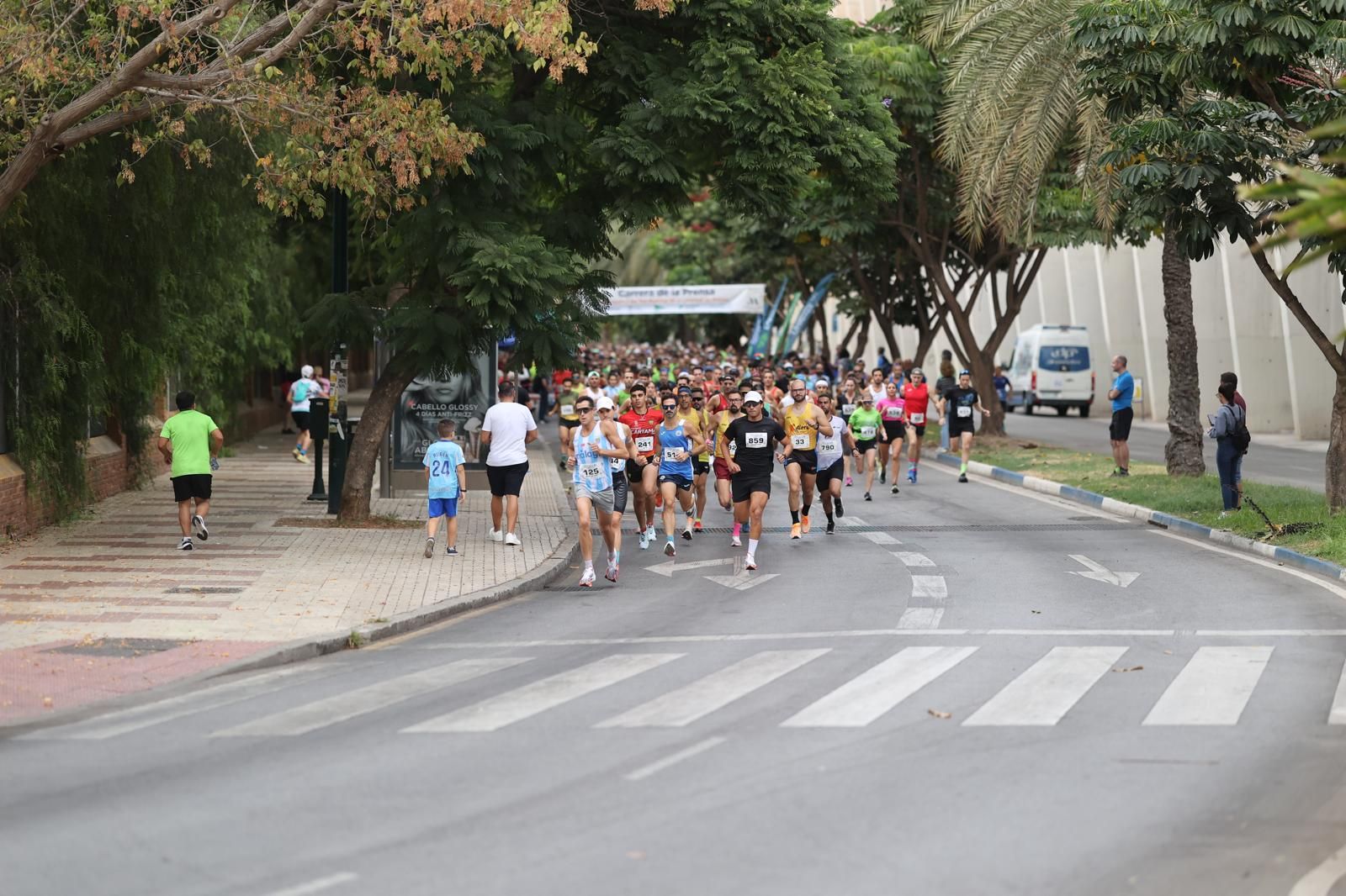 Las fotos de la VIII Carrera de la Prensa y la IV Marcha Solidaria de Málaga
