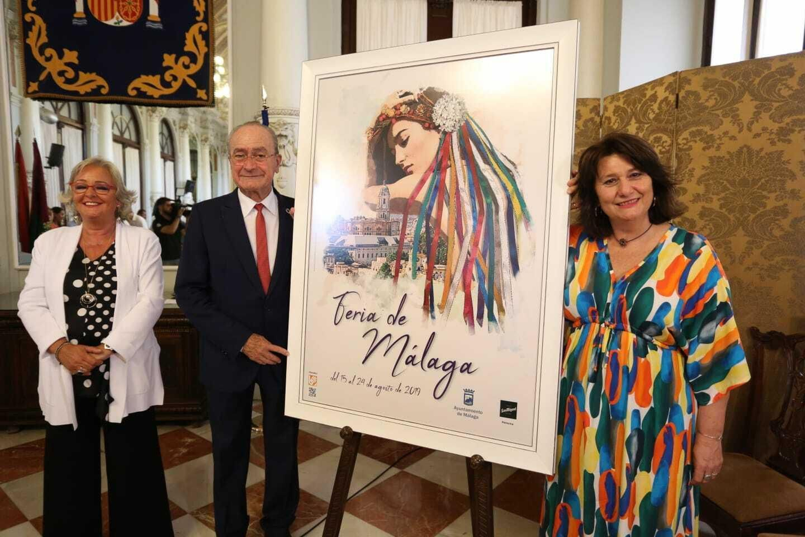 Teresa Porras, Francisco de la Torre y Adelfa Calvo junto al cartel de Feria 2019