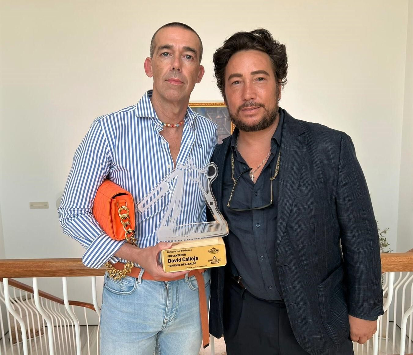 El empresario Isaac Lyonell, con David Calleja.